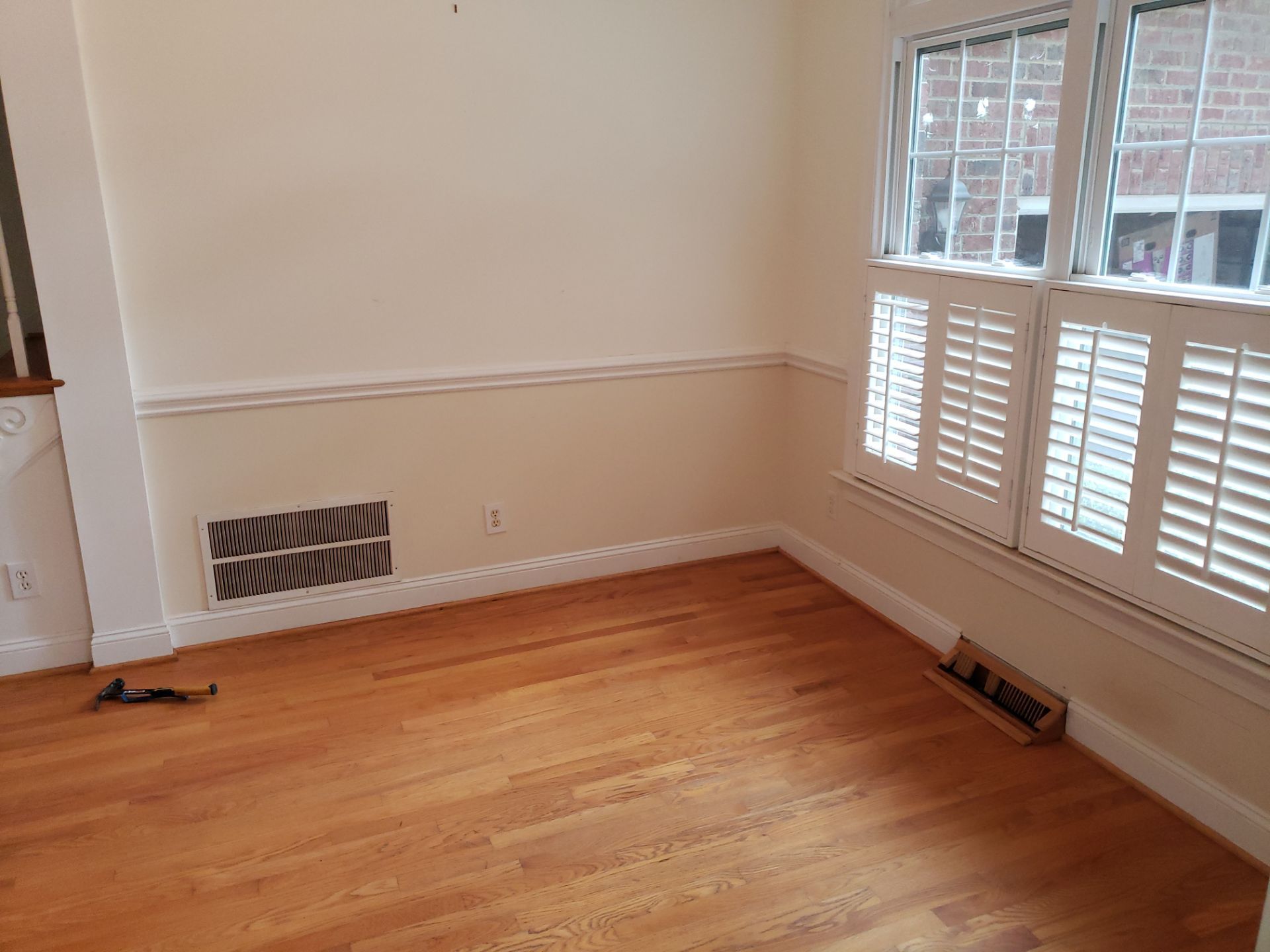 Front Room Transformed into a Waterproof Pet Room by A Step Above Handy LLC 