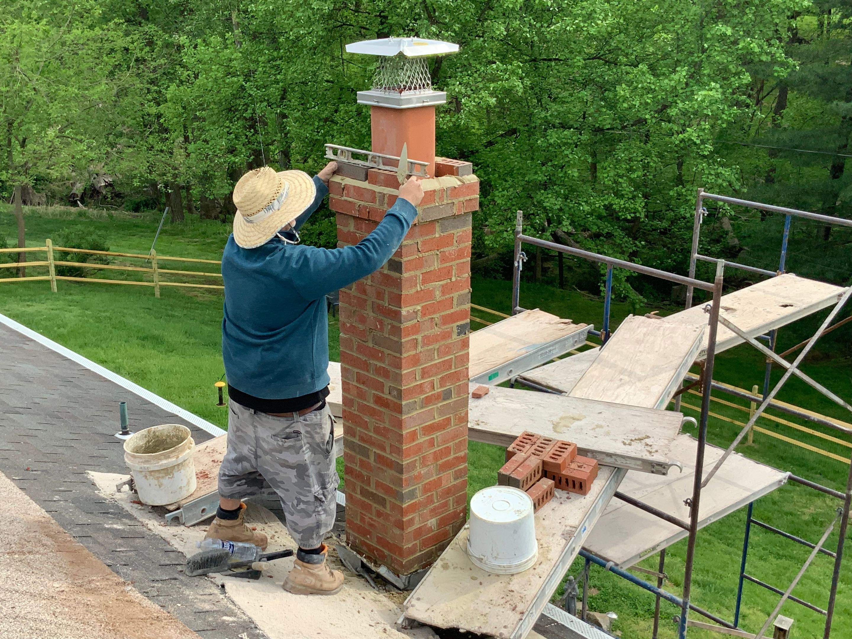 Residential Roofing Installation using Landmark Shingles Color Weatherwood by Alpha Design Services