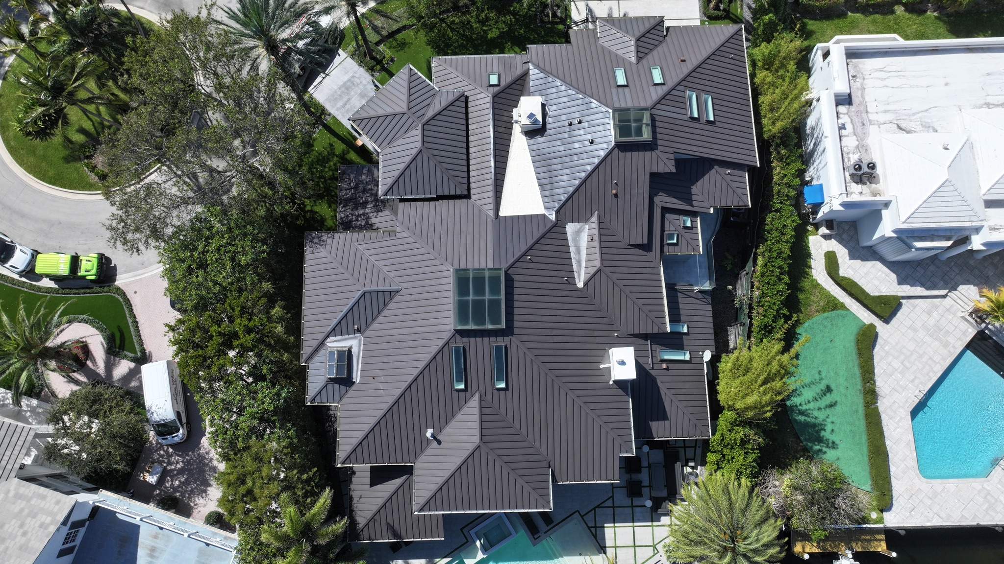 24ga 1.5" Mechanical Seam Dark Bronze by Total Roofing System The Metal Roof Experts