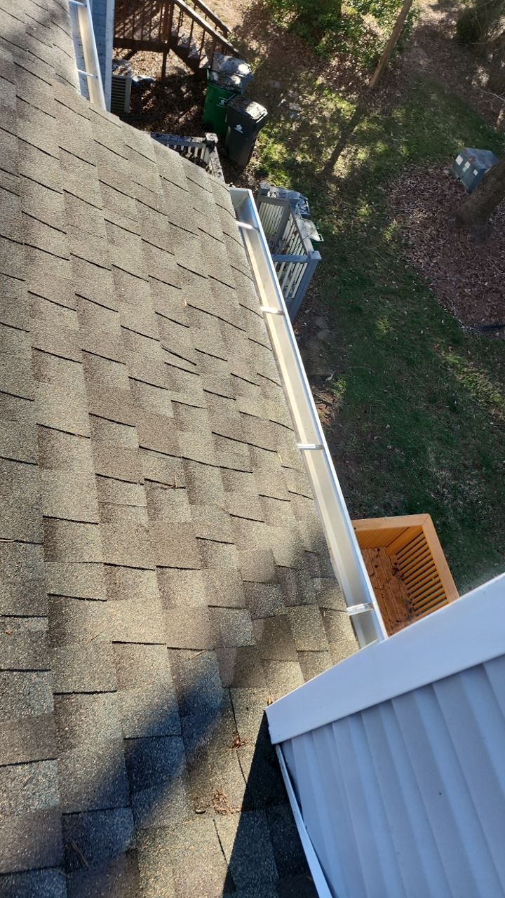 Gutter Cleaning using water by Power Wash Masters LLC