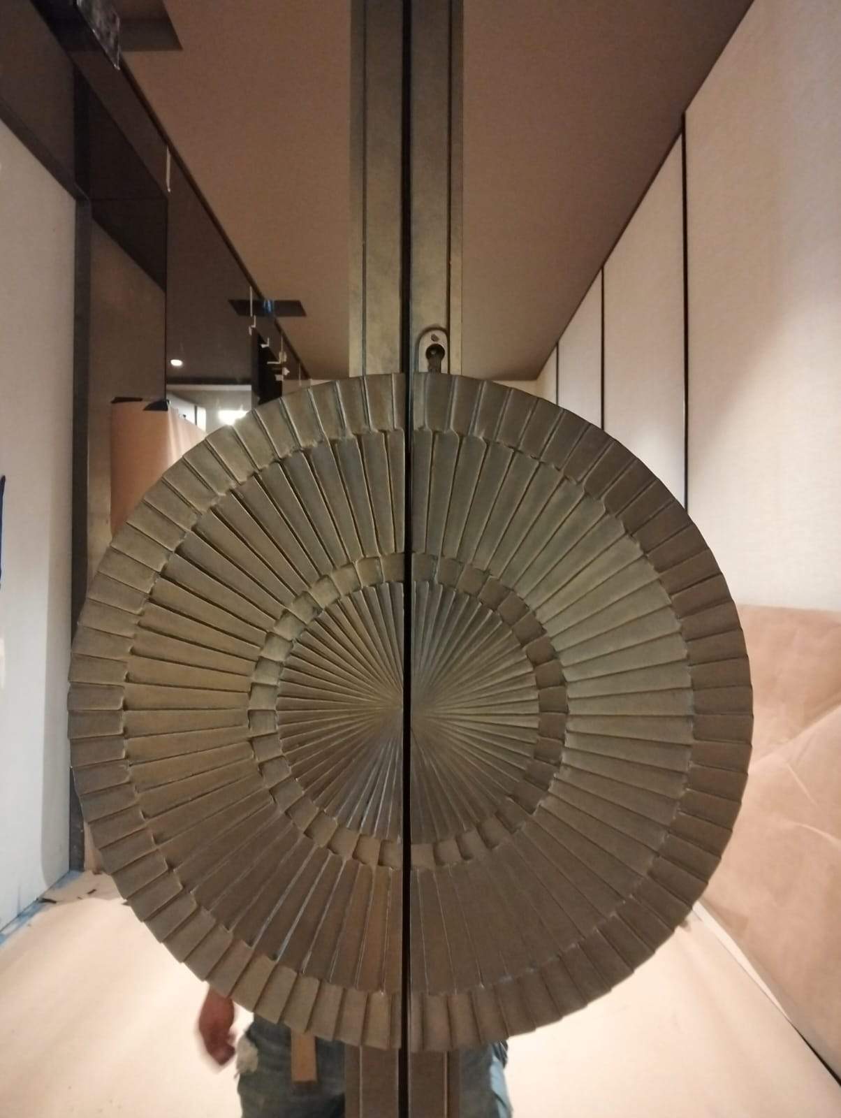 Modern Black Frame Double Door Installation with Custom Radial Hardware by Solara Custom Living