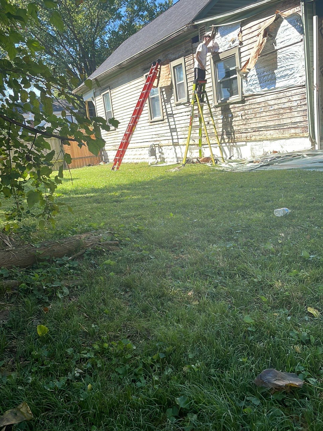 Rental Property Restoration, siding, flooring, gutters, landscaping by Storm Contracting 