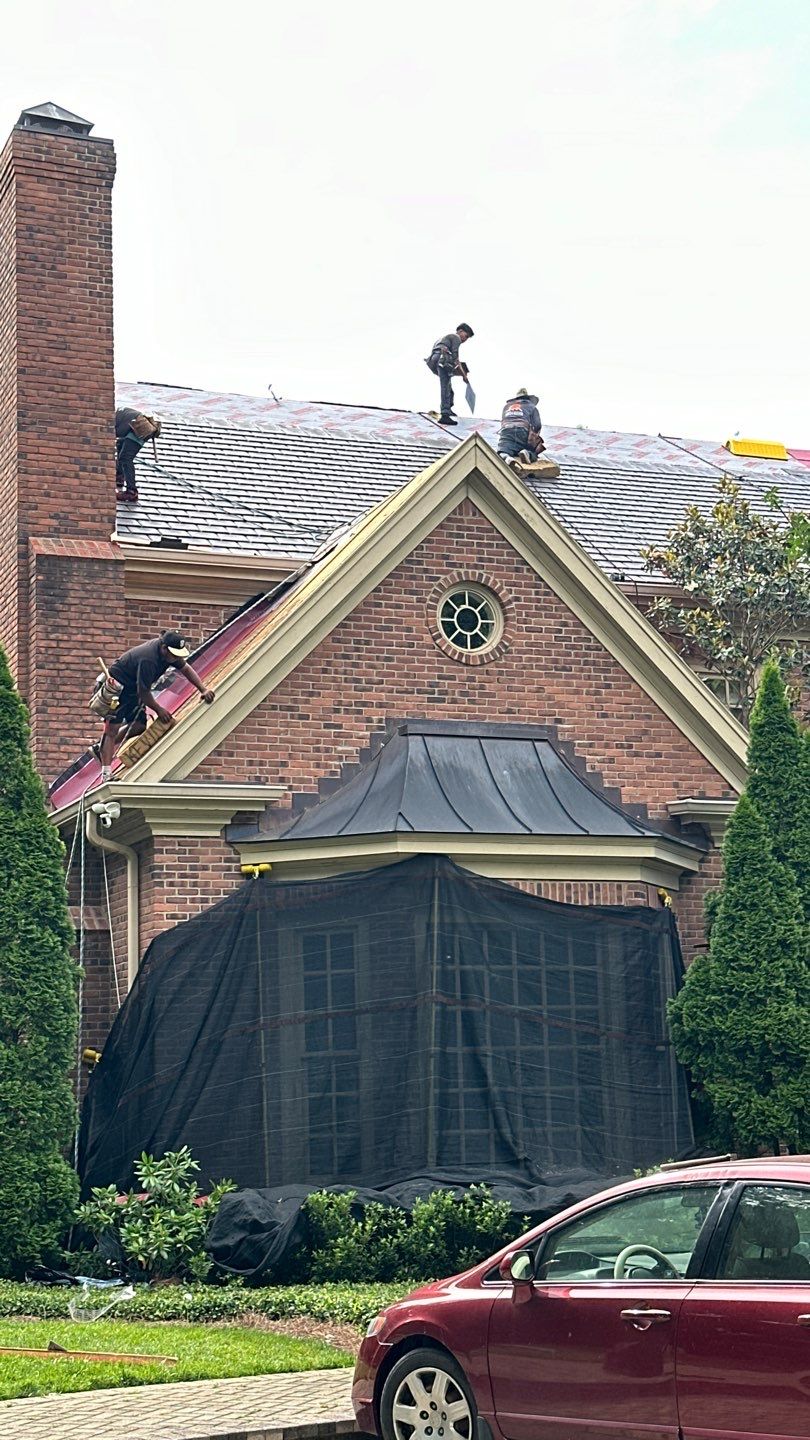 Residential Roofing Installation Using Enviroshake Synthetic Slate by Undersun Roofing 