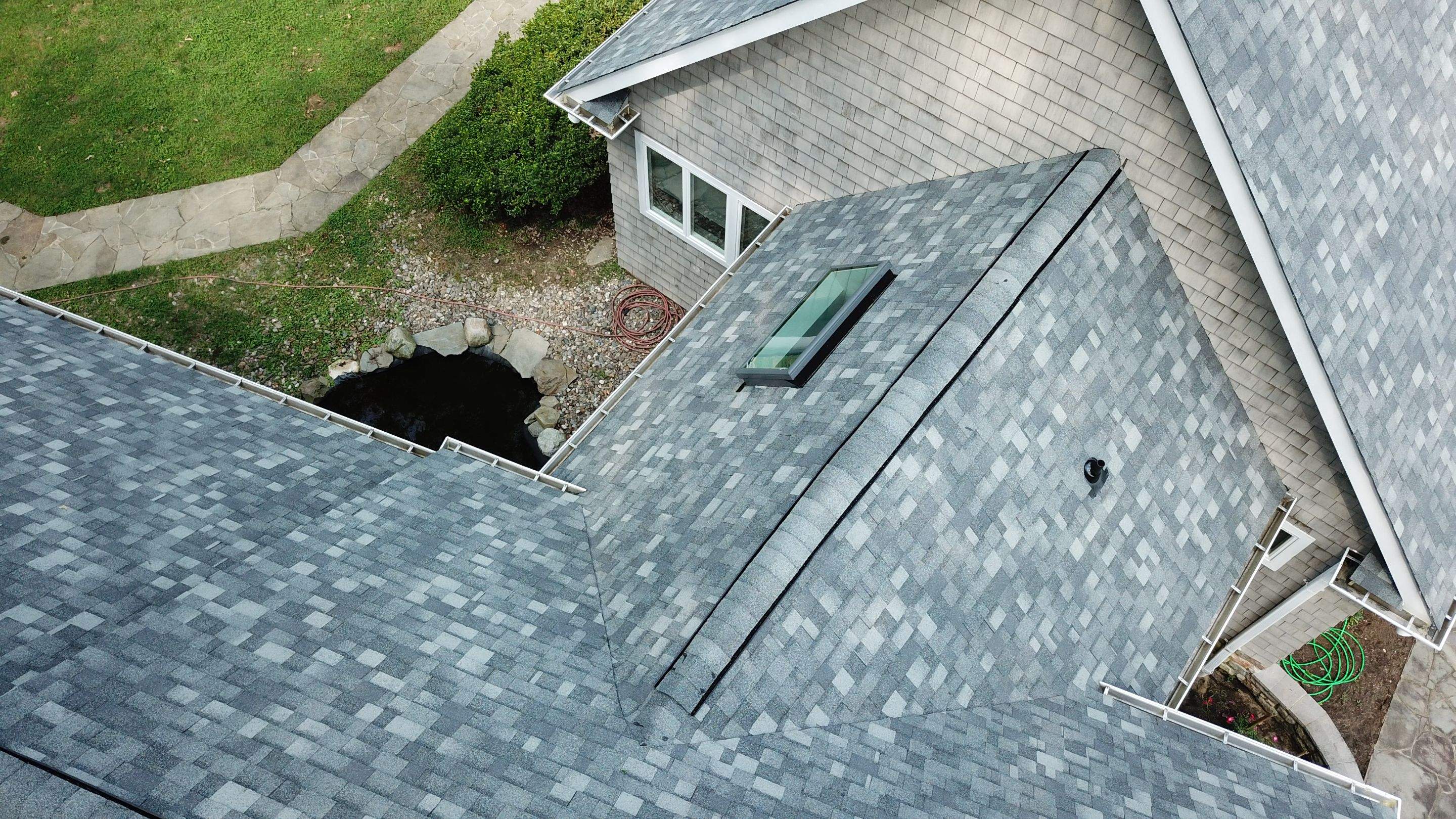 Roof Replacement using IKO Dynasty by American Home Contractors