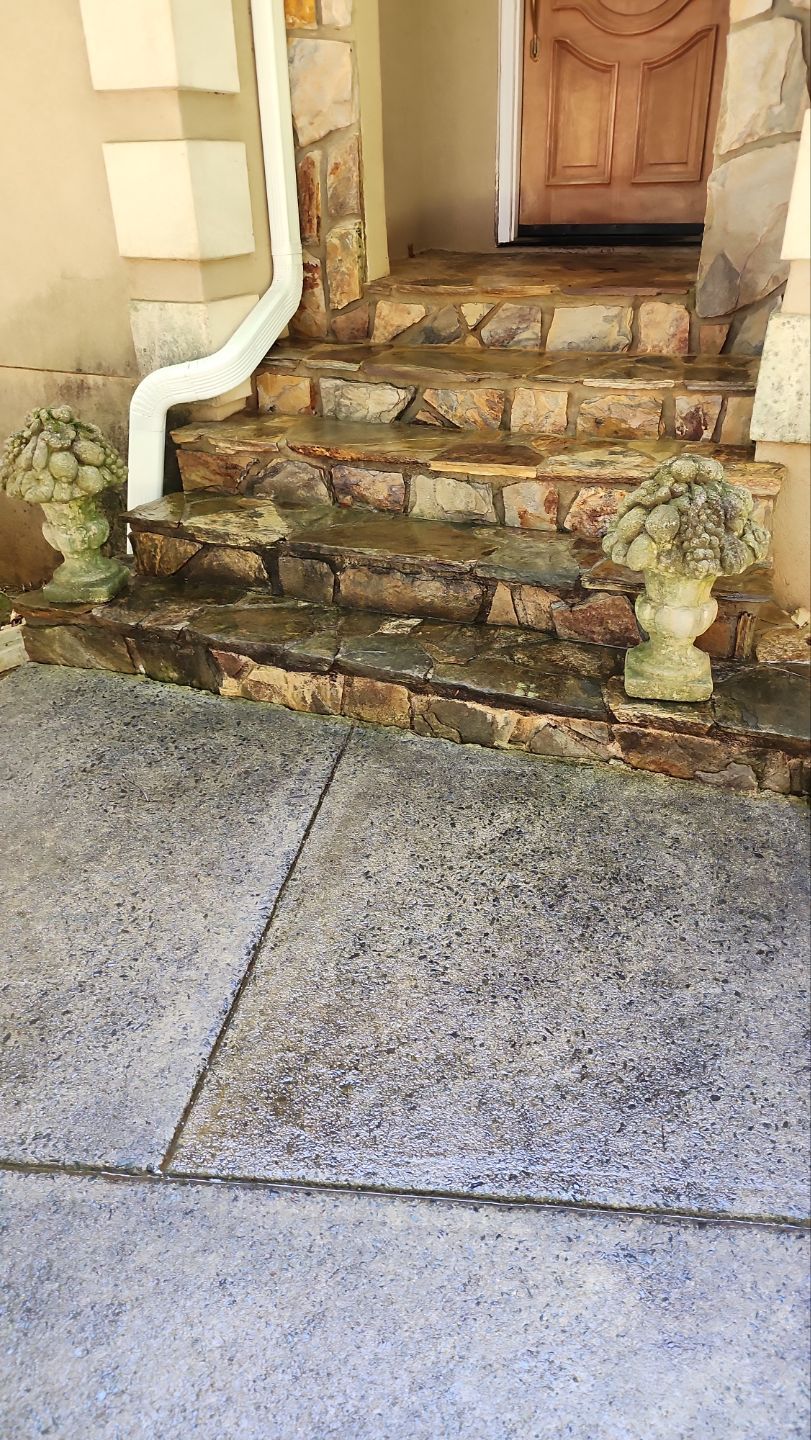 Driveway Clean using cleaner by Power Wash Masters LLC
