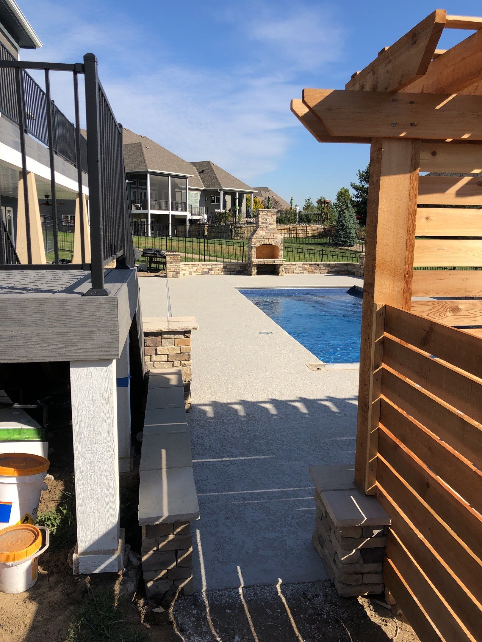 Parkville, MO -- Pool Deck Coating with Classic Texture (knockdown) finish by Big Red Decorative Concrete, LLC