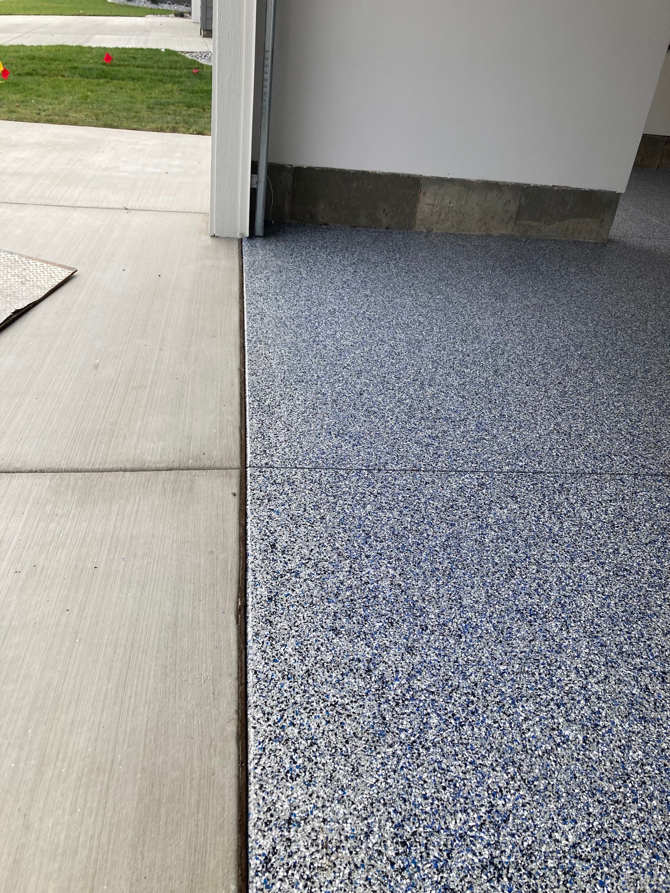 Garage Transformation using Domino with Blue by Croc Coatings, LLC