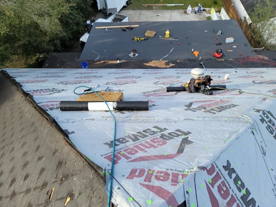 Residential Roofing Installation using Roof Replacement by American Roofing & Construction LLC