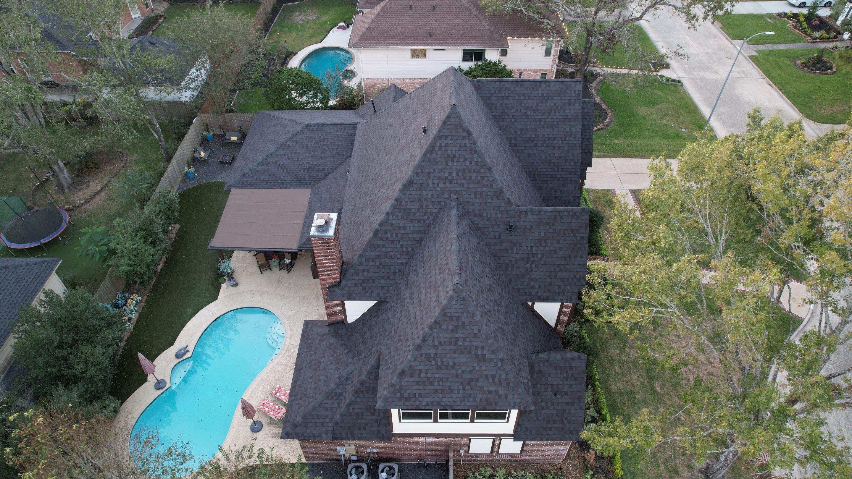 TAMKO Titan XT Black Walnut by STX Roofing