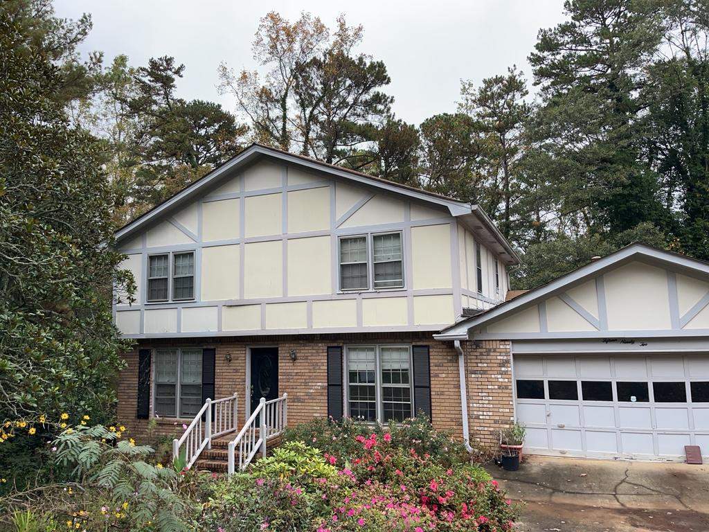 Board and Batten Siding Installation and Railing Replacement in Lilburn, GA by Nelson Exteriors 