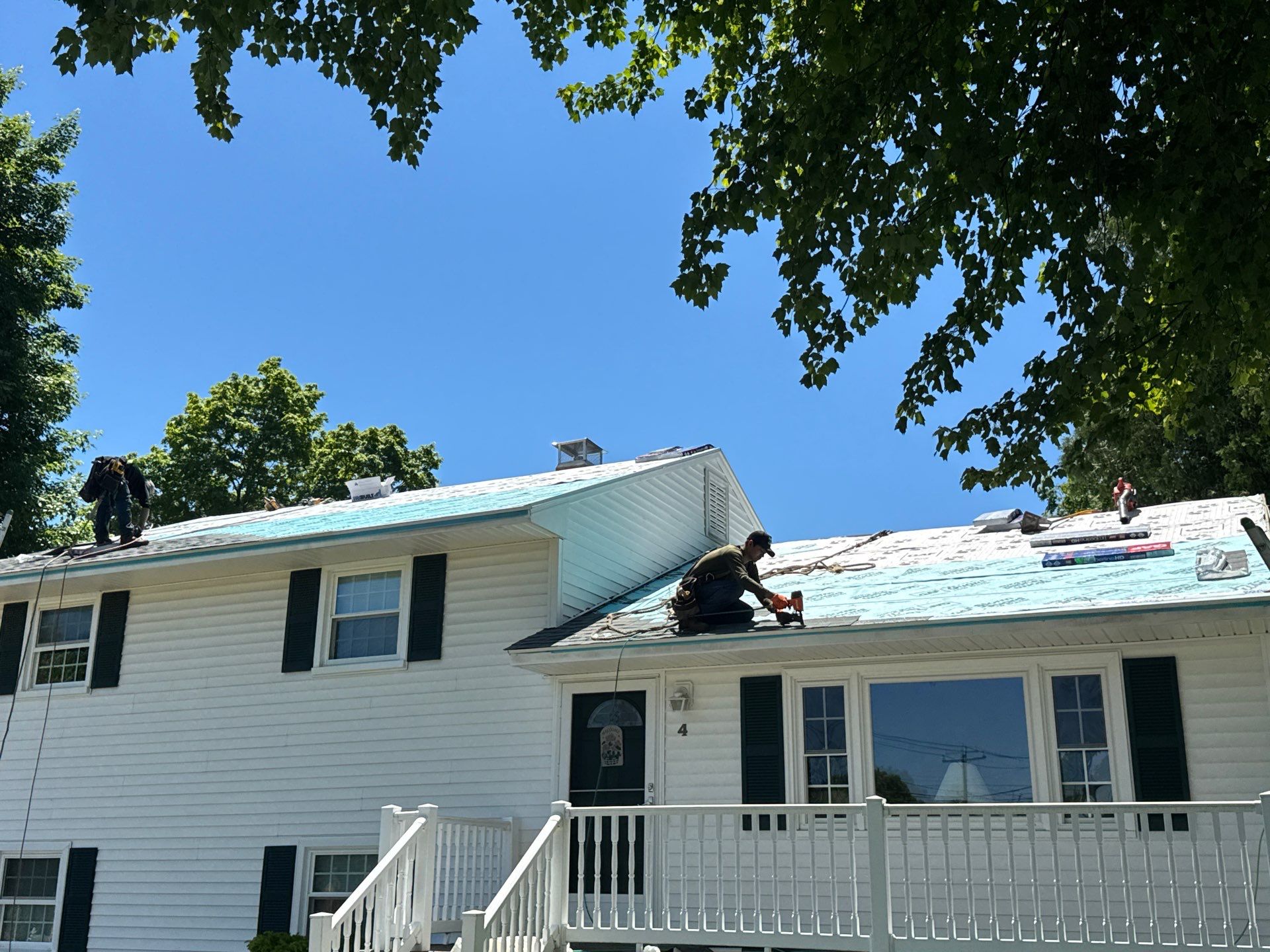 Beautiful new asphalt shingles on a roof in Vernon! by DiGiorgi Roofing and Siding Inc