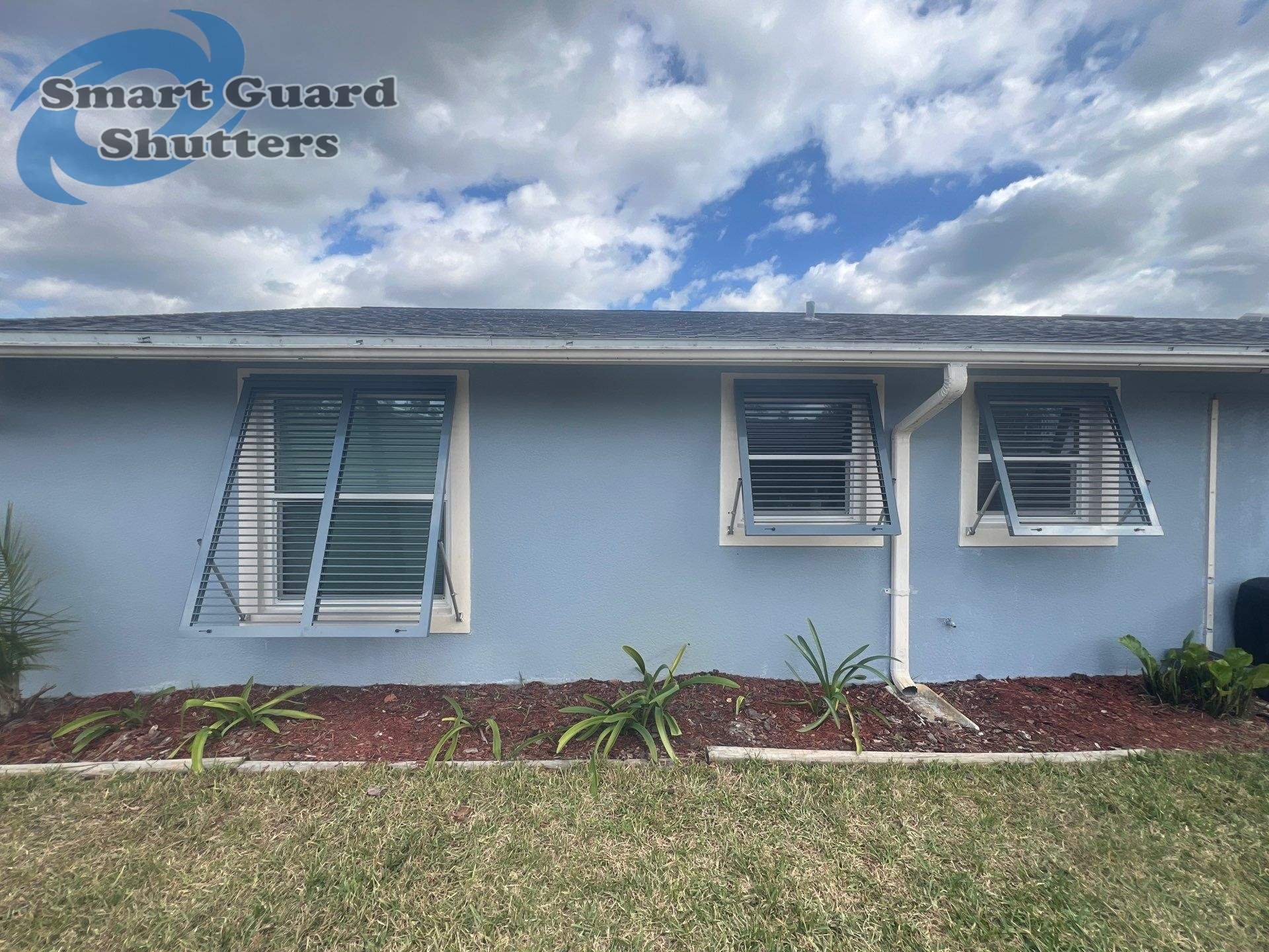 Hurricane Protection in Blue Grey by Smart Guard Shutters