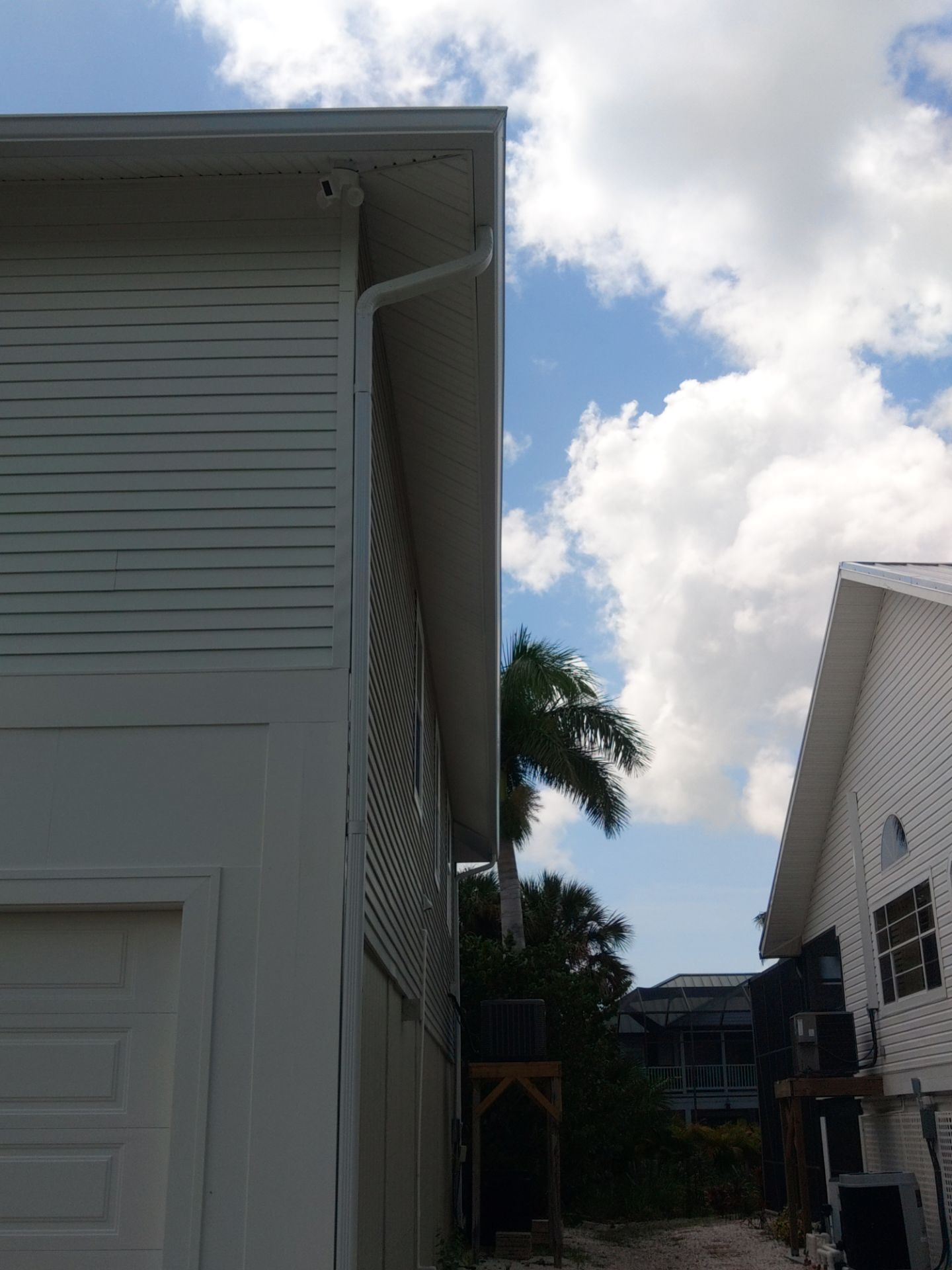 Complete Gutter System with Downspouts & Guards in Fort Myers Beach FL by Gutter Professors