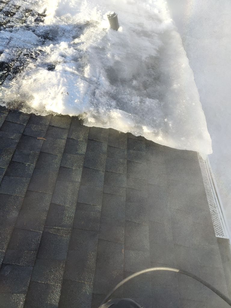 Steaming and Installing New Covers and Heating Cable by Next Level Seamless Gutters / Exteriors Inc.