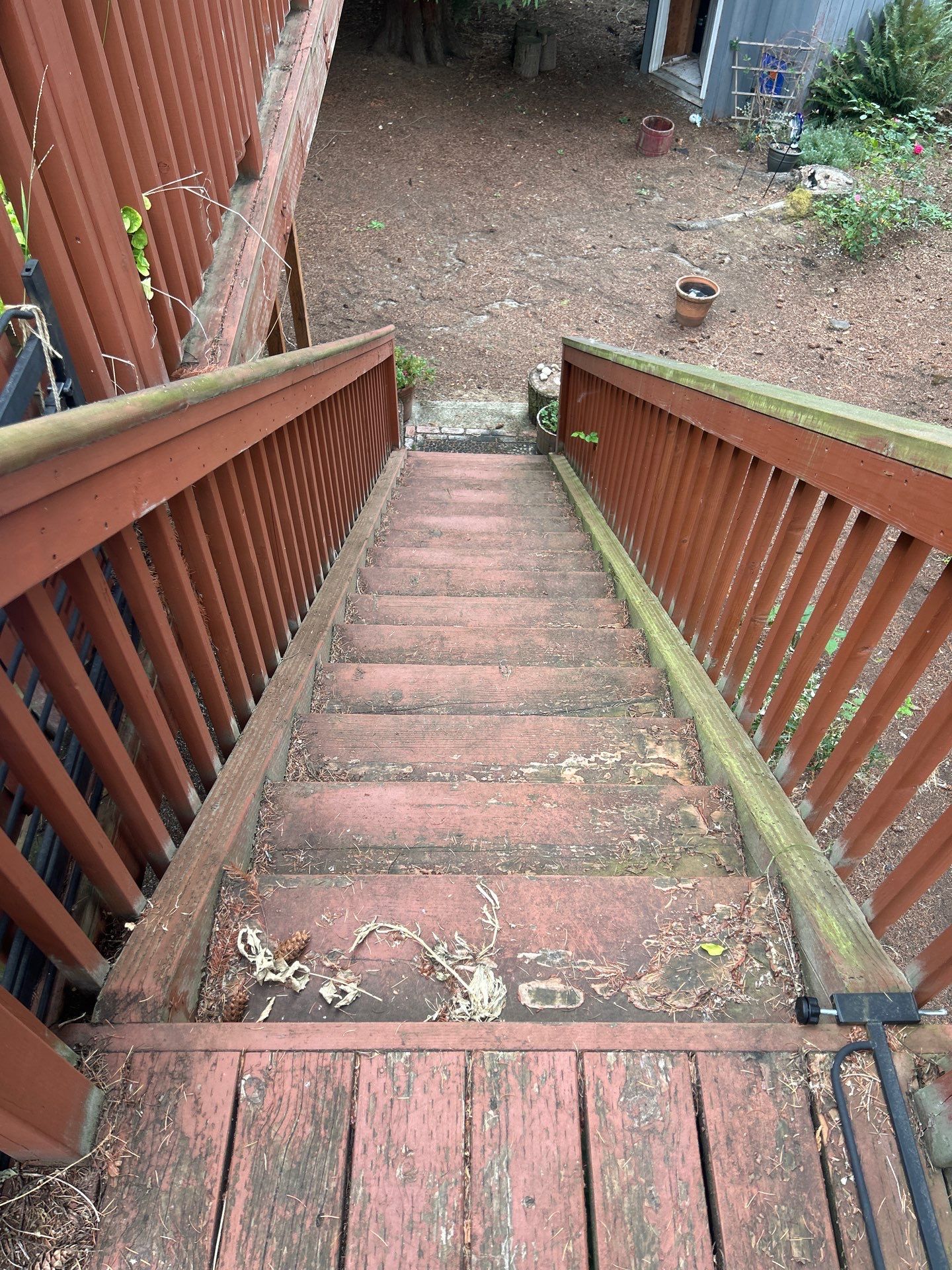 Elevated TimberTech Composite Deck Replacement With Black Metal Railings by Emerald City Energy