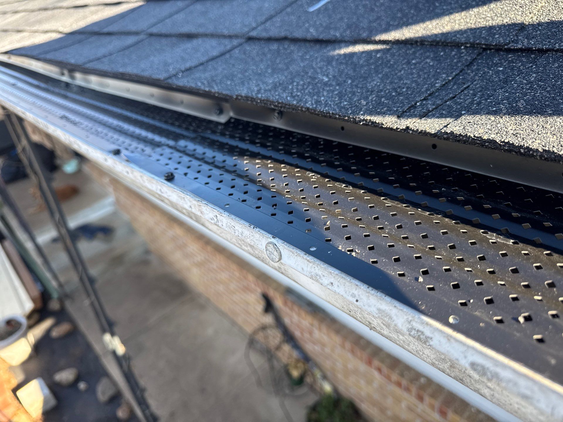 Residential Roofing & Gutter Guards Install  by Titan Commercial & Residential Roofing 