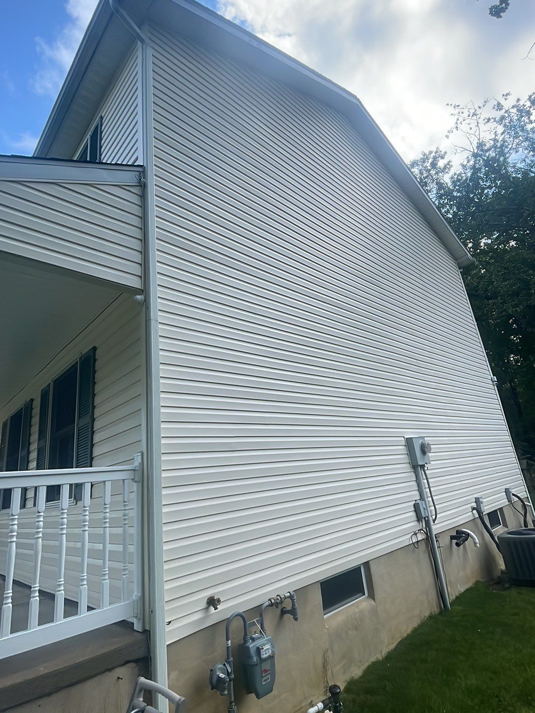 House Wash, Roof Refresh sections & Concrete Cleaning by SJ Exterior