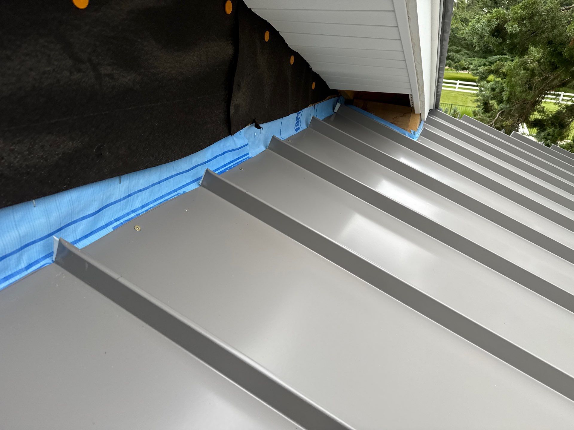 Custom New Construction Metal Roof Installation in Deltaville by Cade Construction