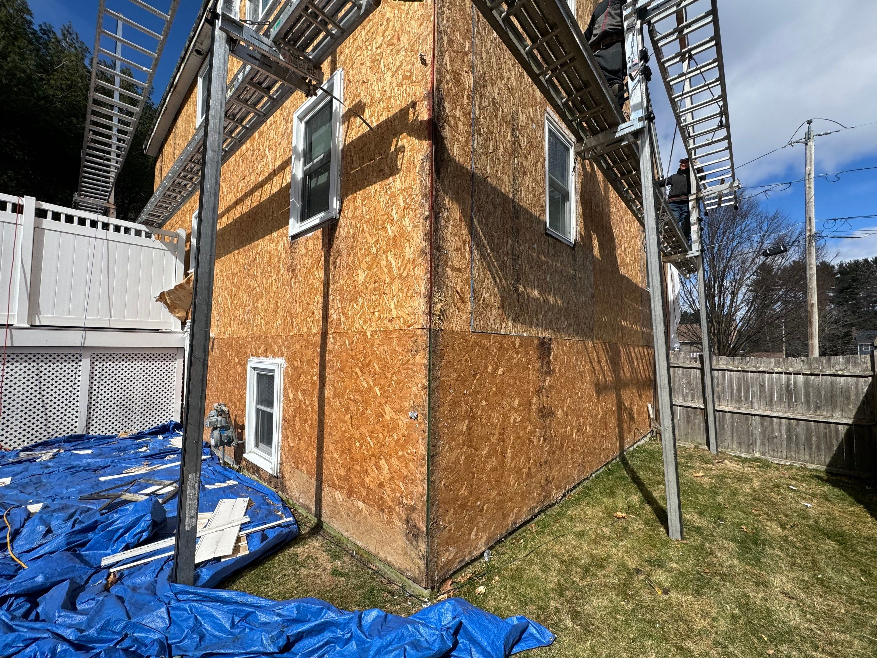 Complete Exterior Renovation with New Siding & Gutters   by Sensible Home Solutions