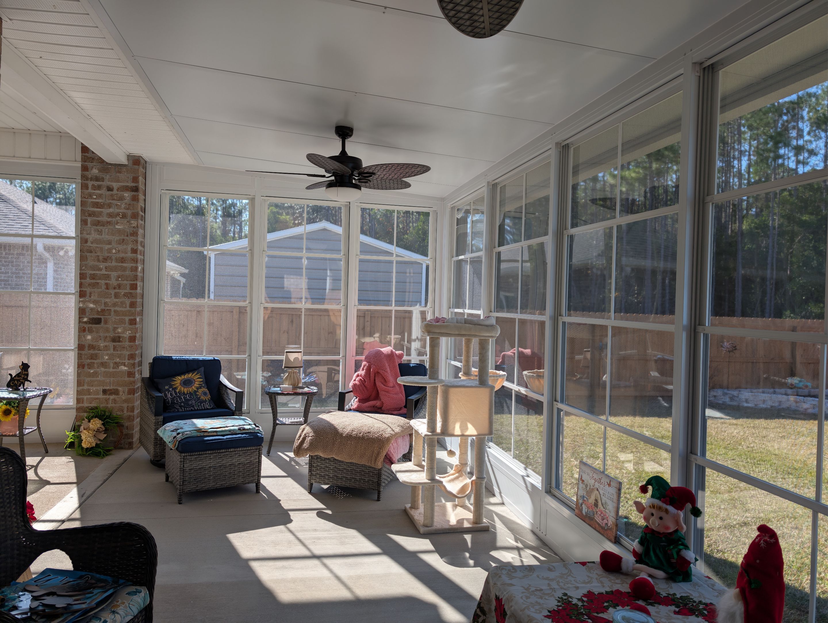 Home addition w/Vinyl 4-Track Windows by Titan Sunrooms