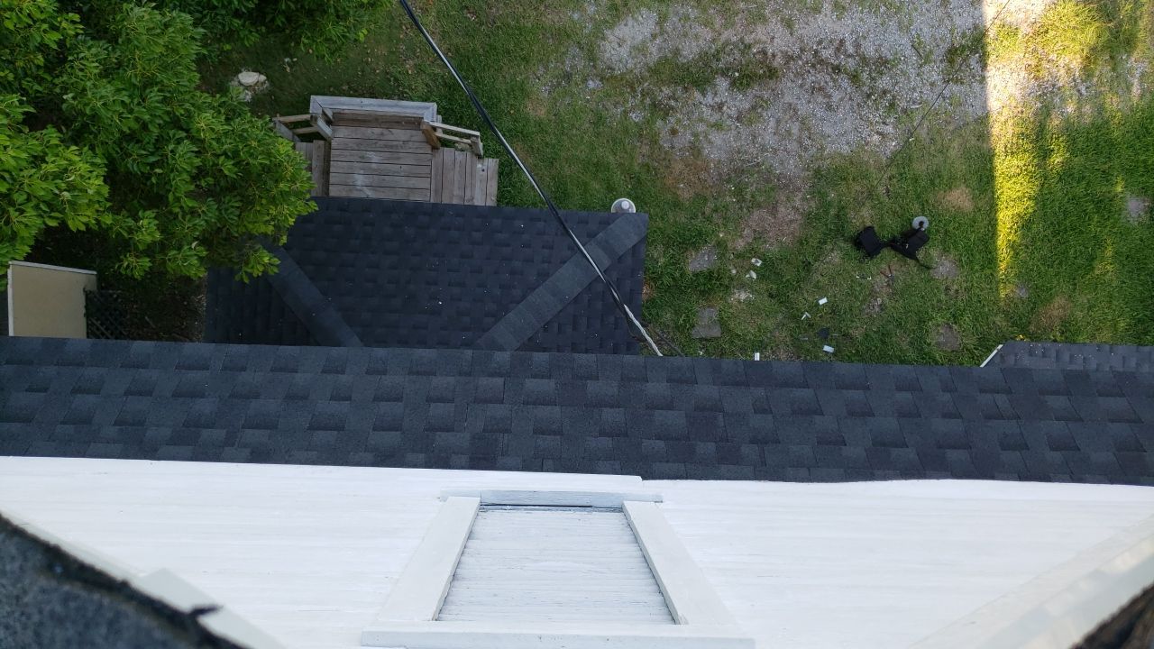 Residential Roofing Installation using Roof Replacement by American Roofing & Construction LLC