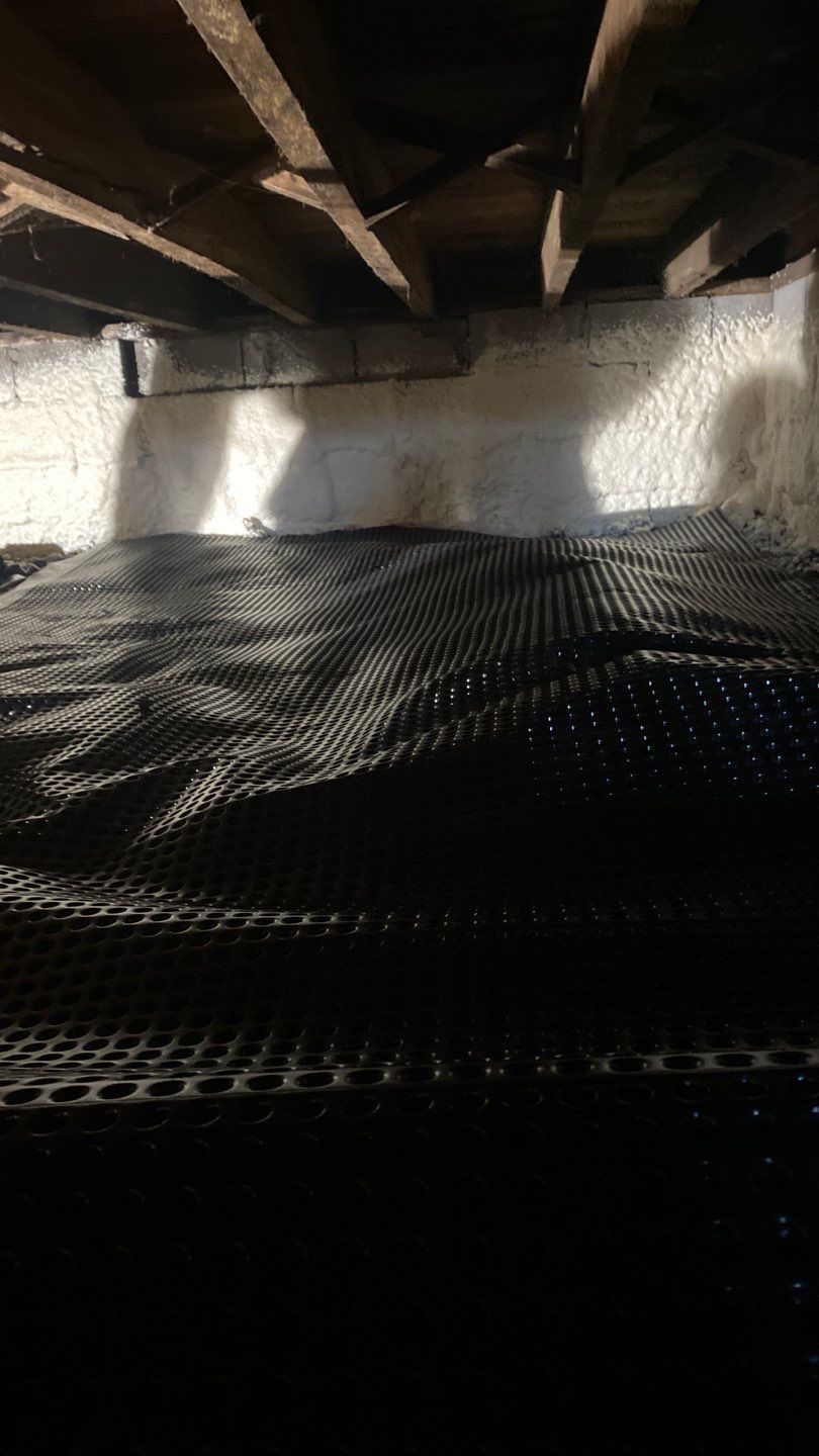 Crawl space encapsulation and Waterproofing using GrateDrain Waterproofing System by Toledo Basement Repair 