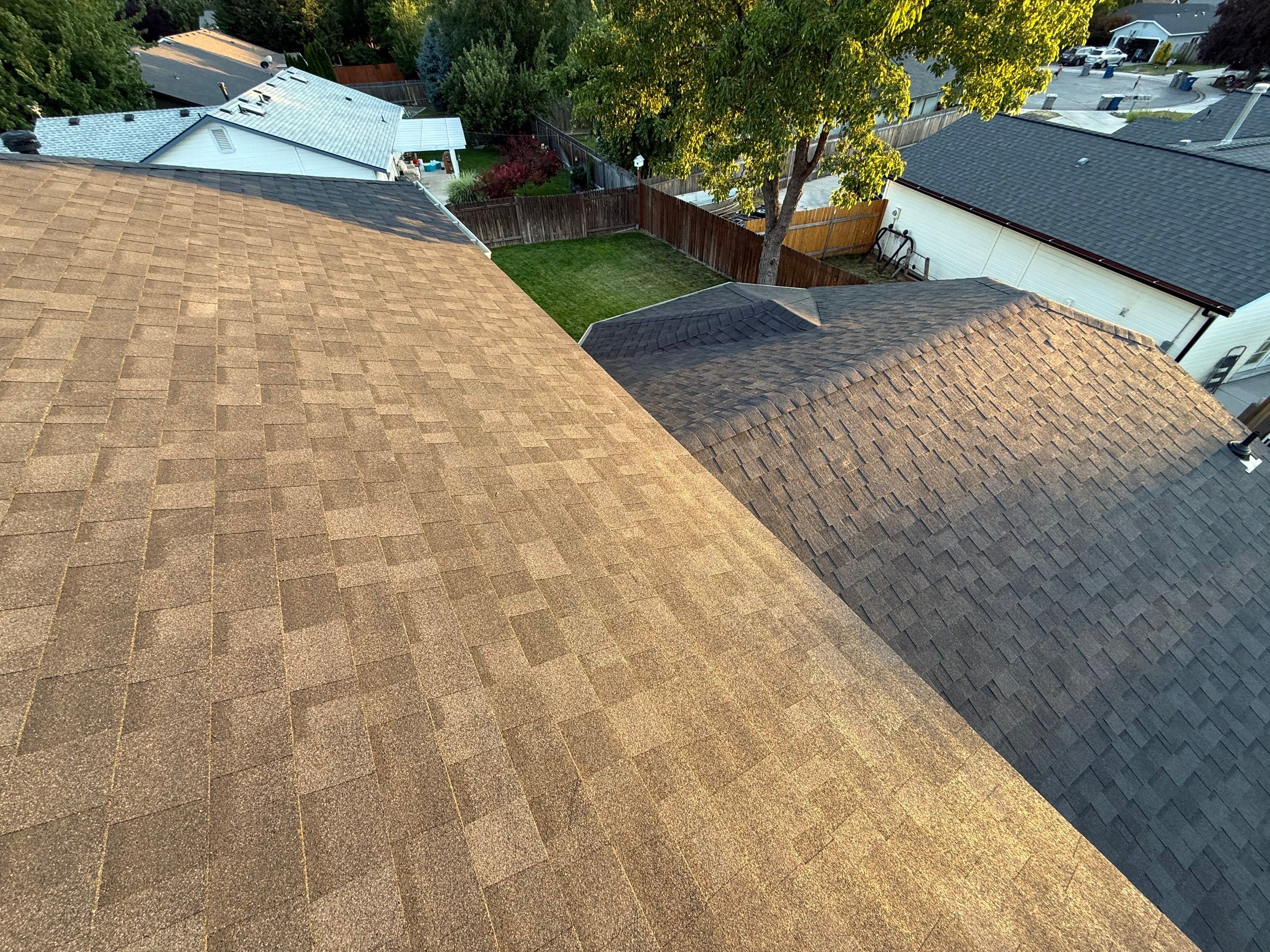 Residential Roof Replacement and Seamless Gutter Installation in Boise by Olive Roofing