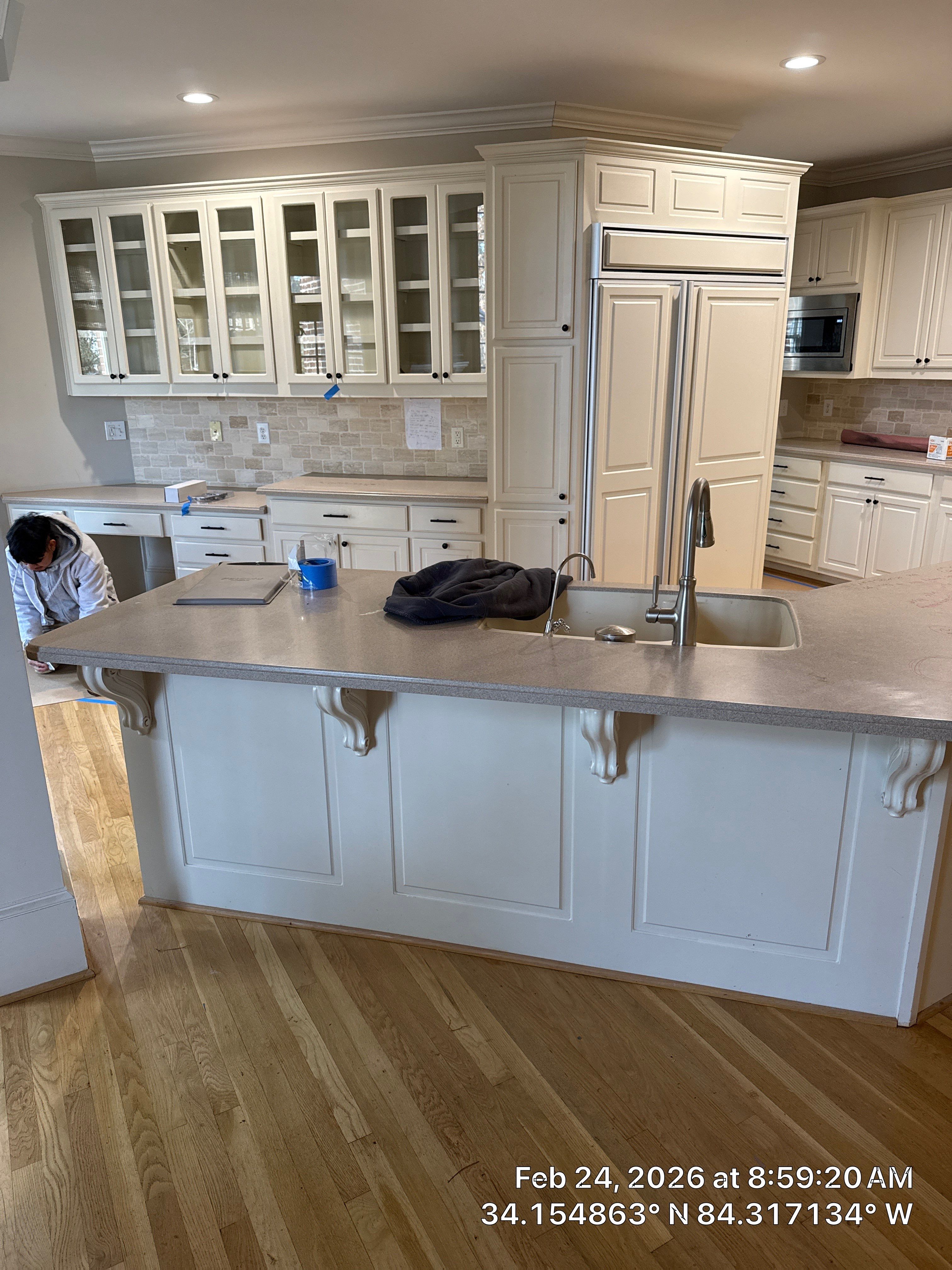 Alpharetta Kitchen Remodel Featuring Double Islands and White Quartz by Heart & Home Kitchen & Bath Remodeling LLC