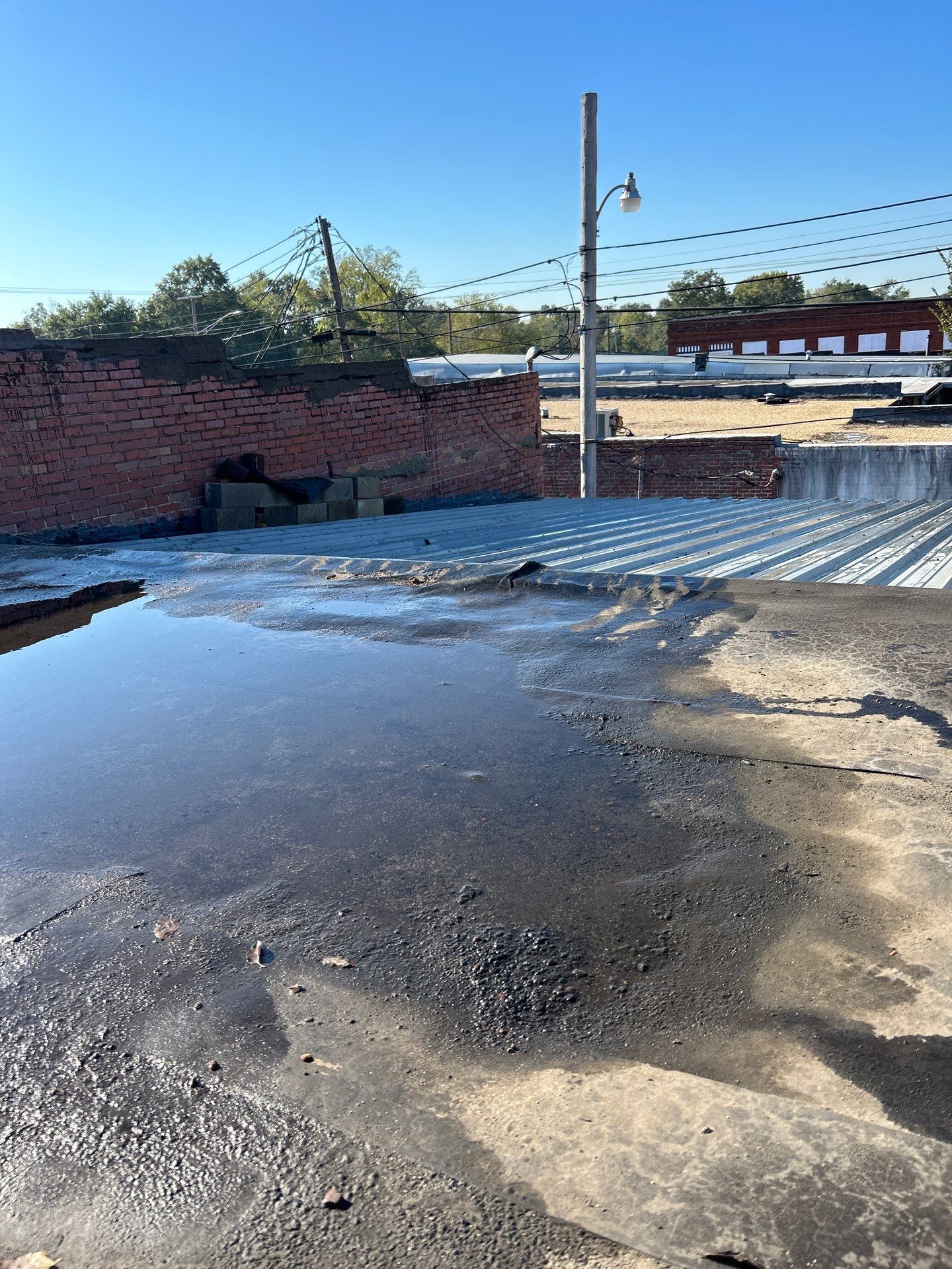 Downtown Gladewater Commercial Foam Roof Restoration – SPF + High-Tensile Acrylic by All Star Roofing LLC