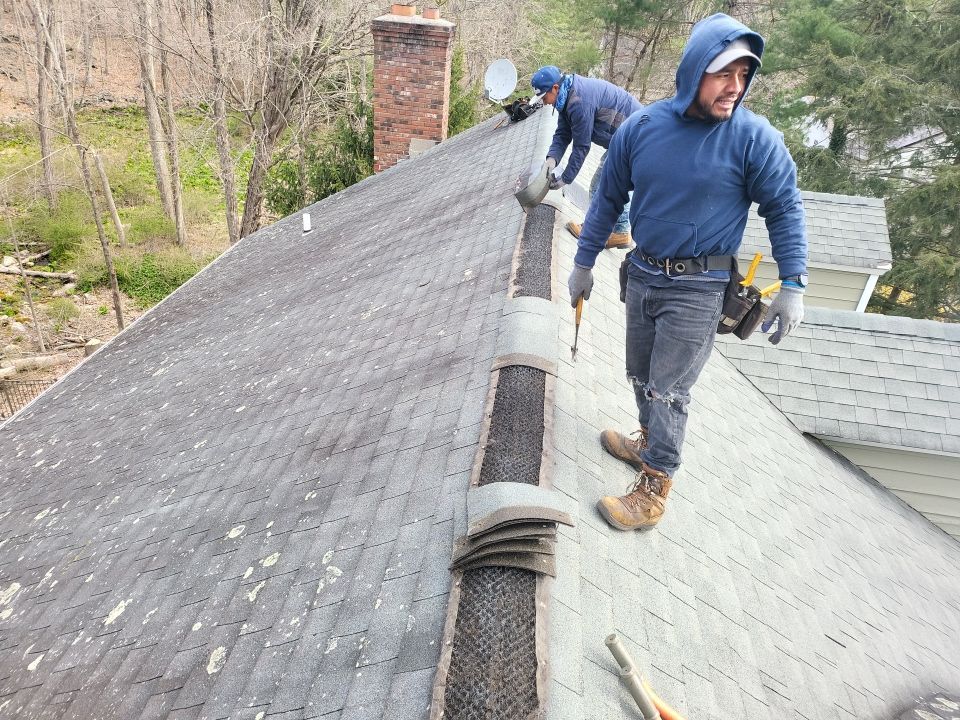 Residential Roofing Installation using onyx black by A Plus Exterior