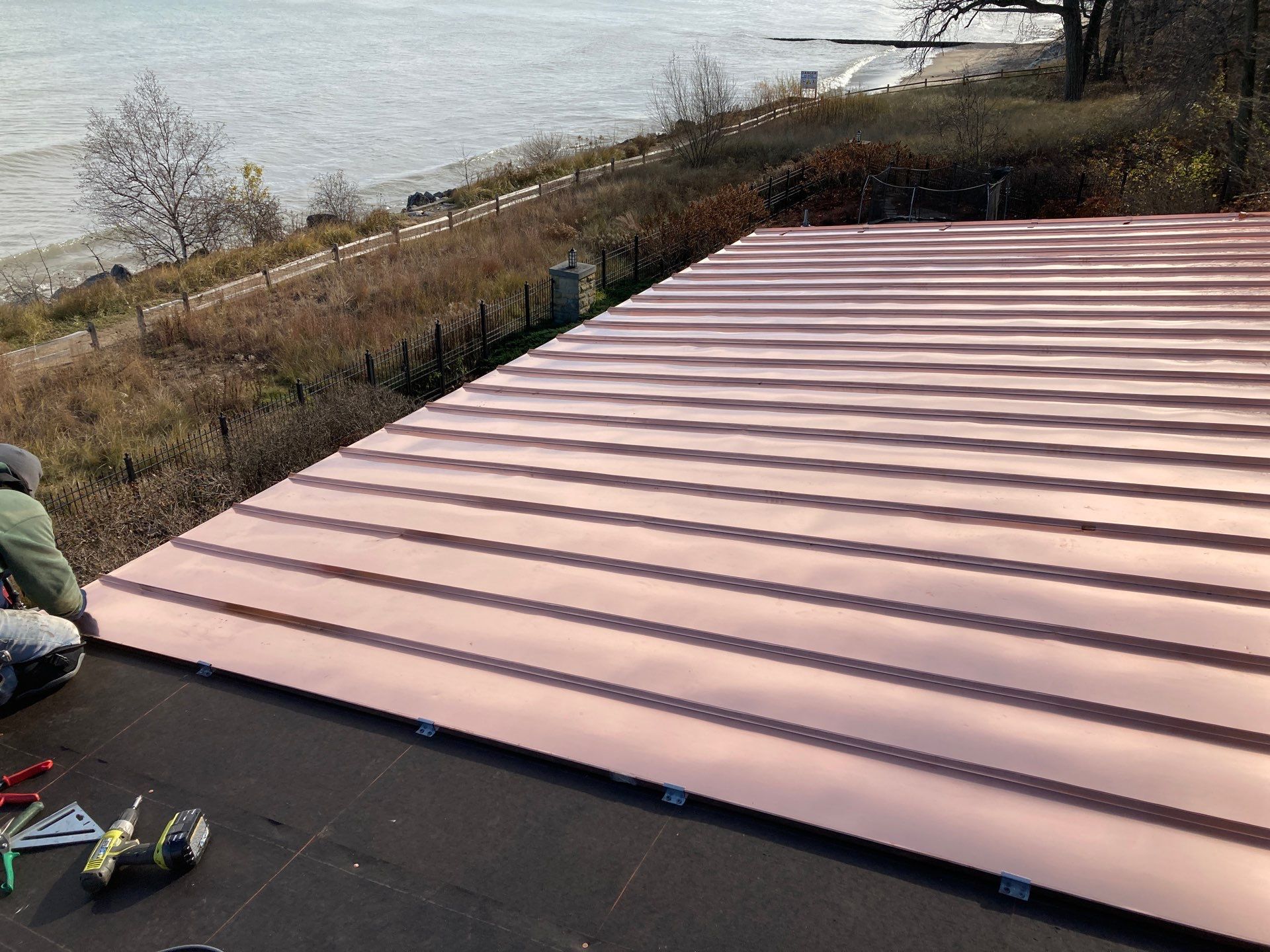 Slate Roof Replacement and Half Round Copper Gutter Installation by Custom Installations