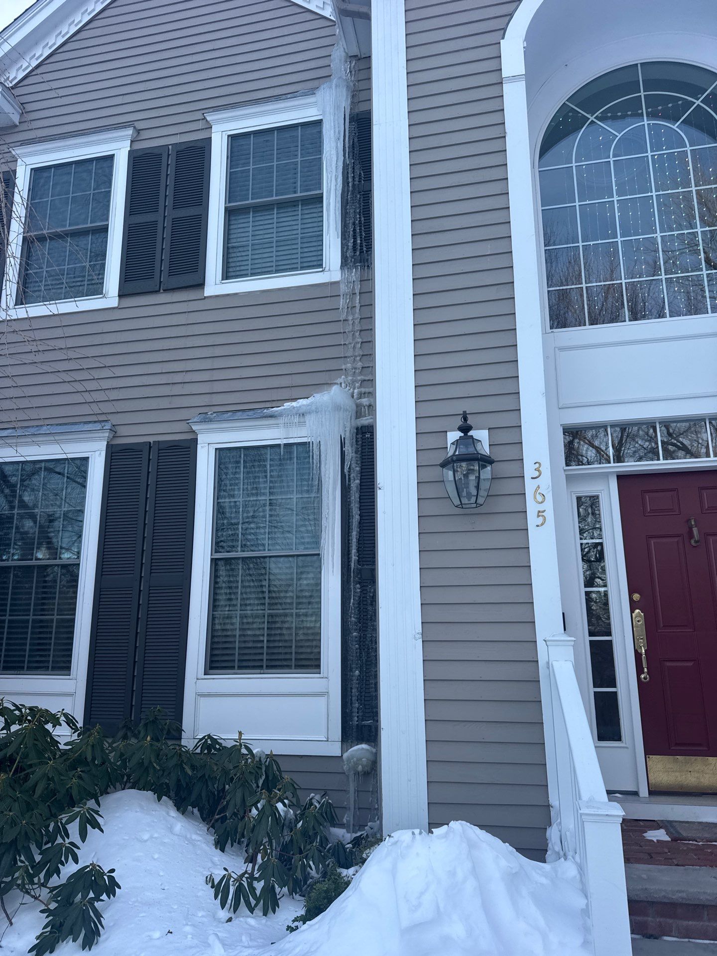 Ice Dam Removal Project in North Andover by Mighty Dog Roofing of Greater Middlesex County