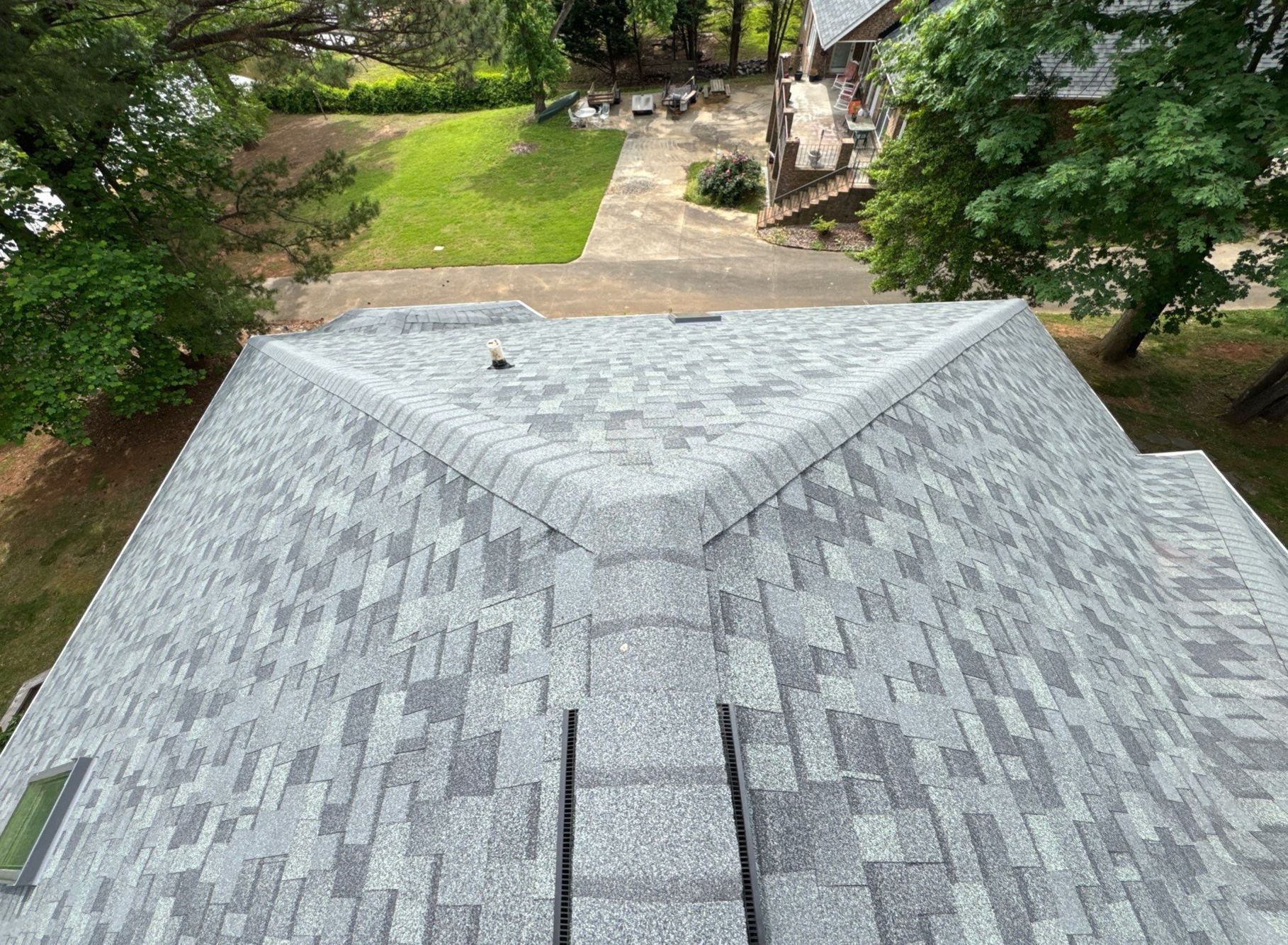 Residential Roof Replacement with Owens Corning Duration Architectural Shingles and 5 Velux Skylights in Charlotte, North Carolina by Merritt Roofing LLC