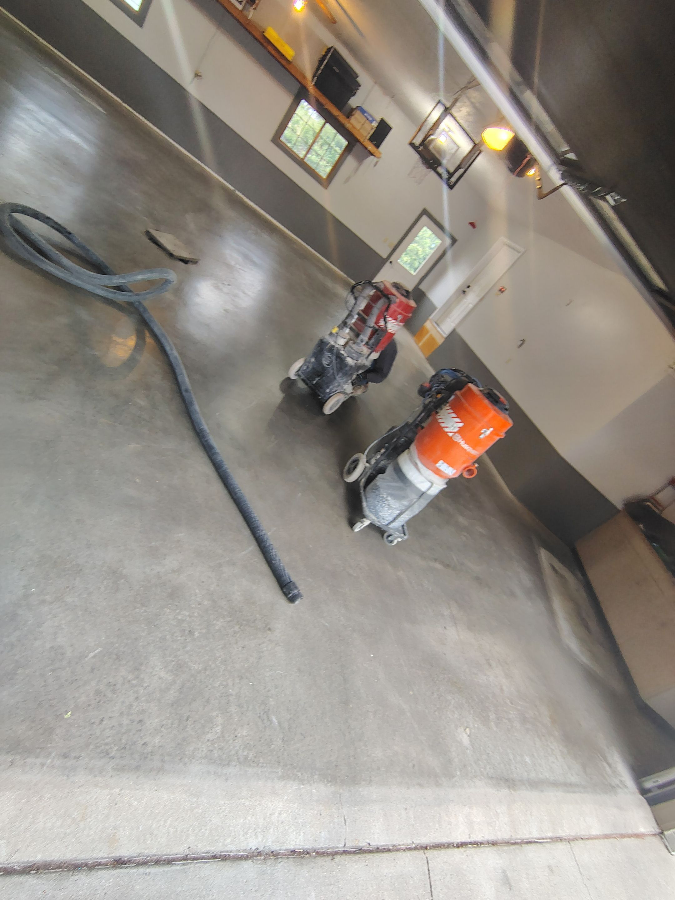 Multi-Fleck Epoxy Garage Floor Coating in Dell Rapids by Select Painting, Coatings & Garage Cabinets