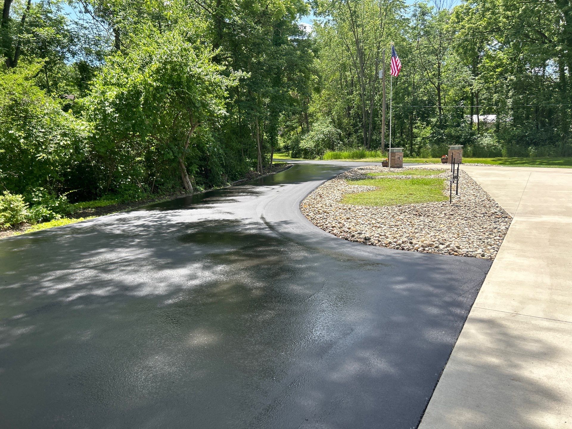 High end residential driveway by Quality Asphalt & Maintenance LLC