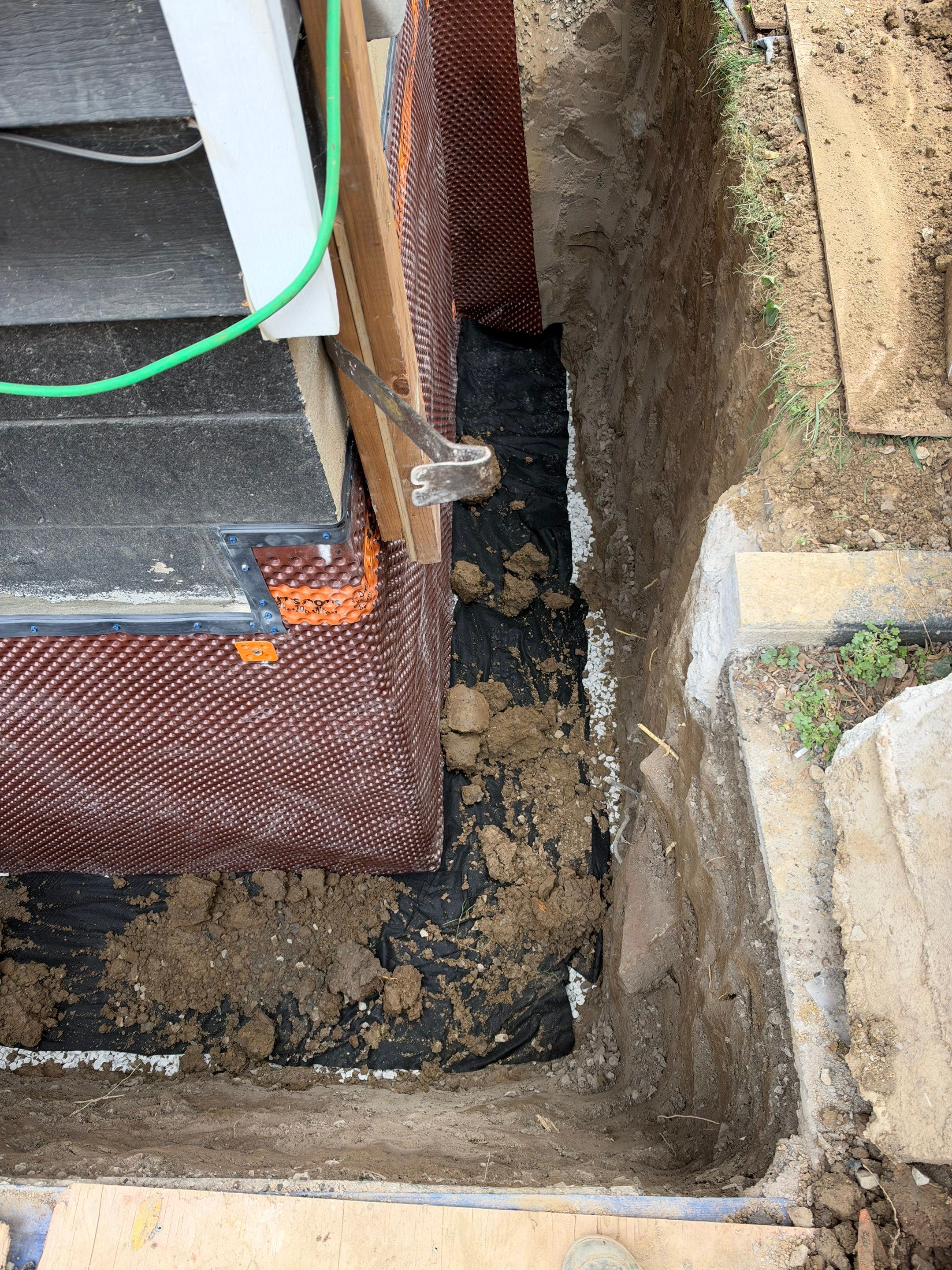 Exterior Foundation Waterproofing and Weeping Tile Installation in Hamilton by Canada Waterproofers Inc