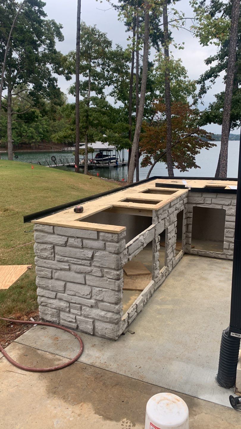 Outdoor Kitchen on Lake Keowee by Xtreme Concrete Services