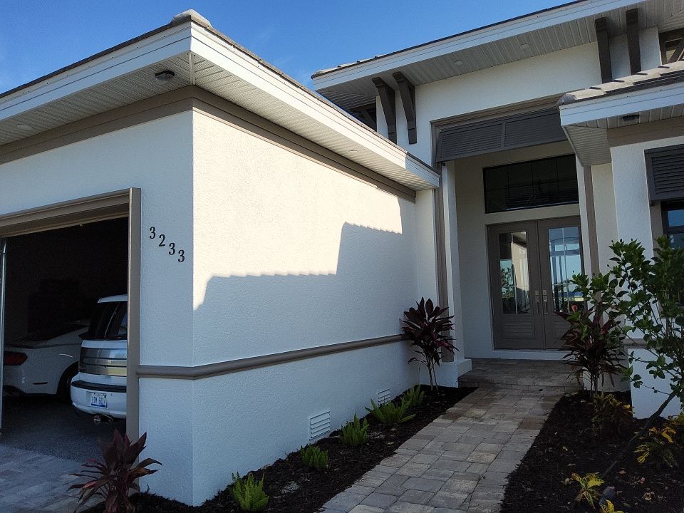 Seamless Aluminum Gutter Installation using 6 Inch Seamless Gutters in Cape Coral FL by Gutter Professors