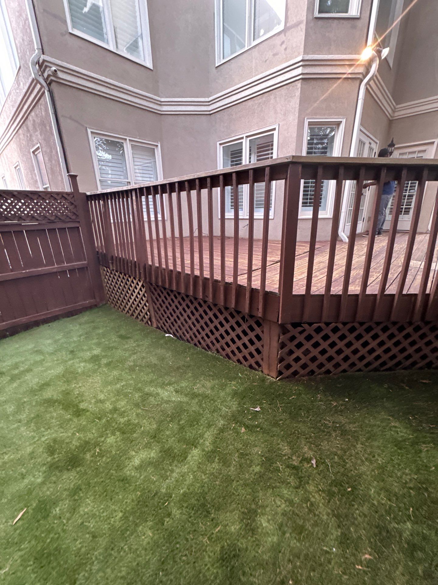 Full Exterior Stucco Painting and Wood Deck Staining in Atlanta by Swift Home Renovations