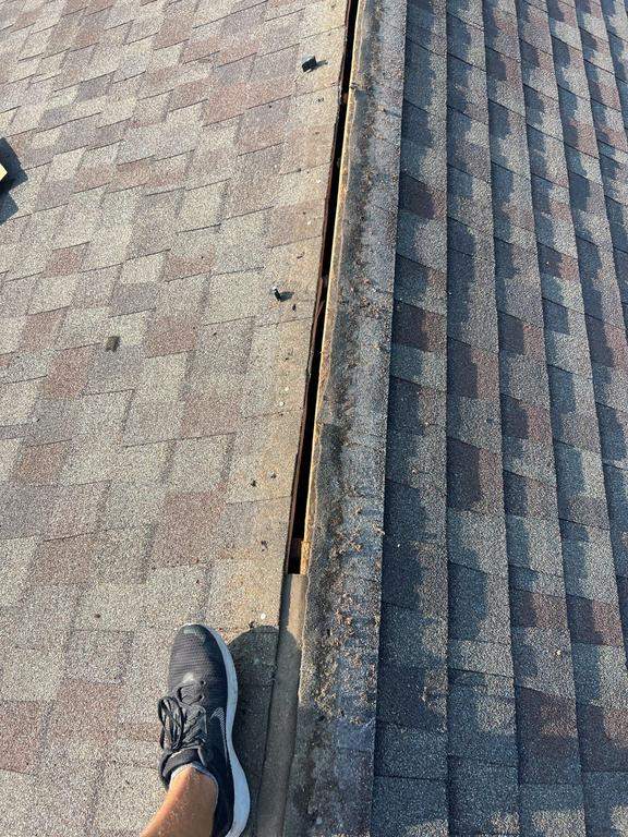 Residential Roofing Repair using Ridge vent replacement by Nitro Roofing and Construction