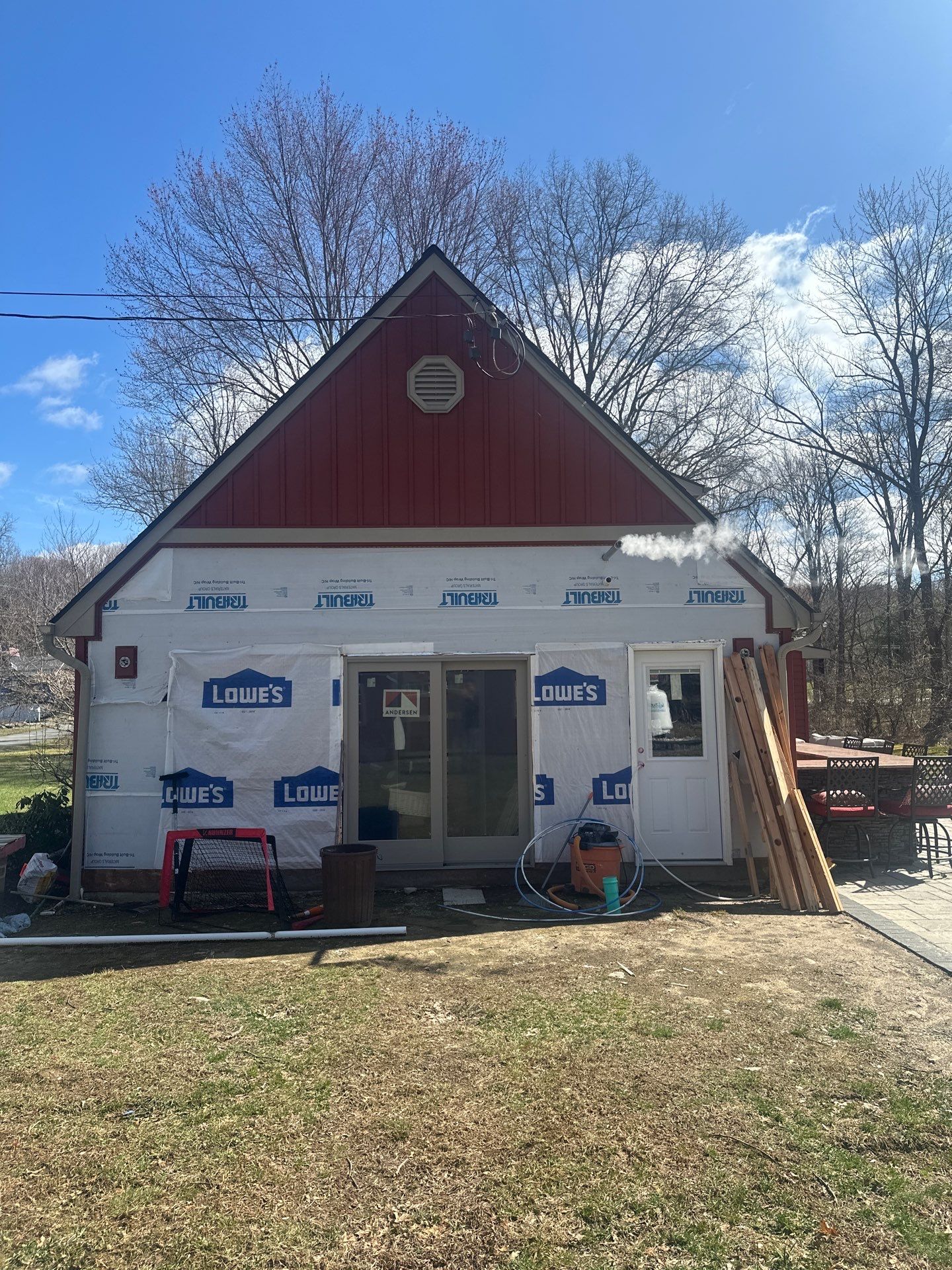 Red Siding in Beaver Dam NY by roberts roofing
