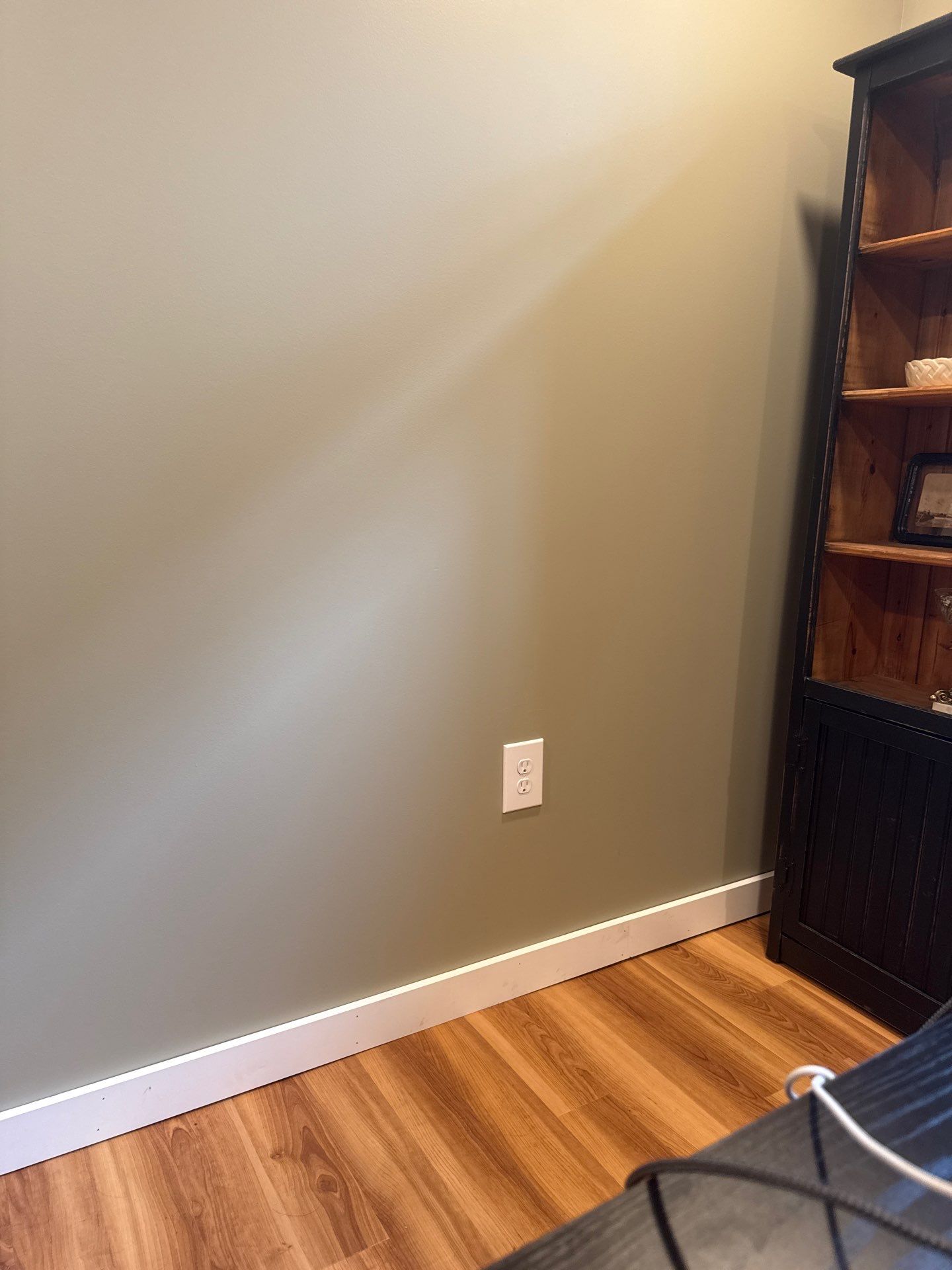 Lincoln Interior Renovation Featuring Sage Green Walls and Laminate Flooring by CompanyCam Sales Demo