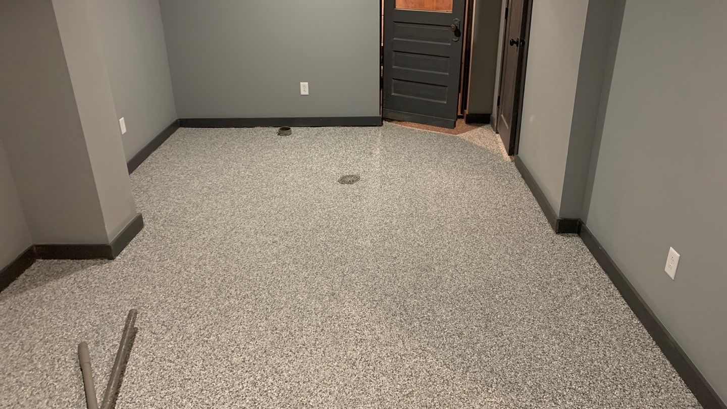 Basement using Slate Stone by Select Painting, Coatings & Garage Cabinets