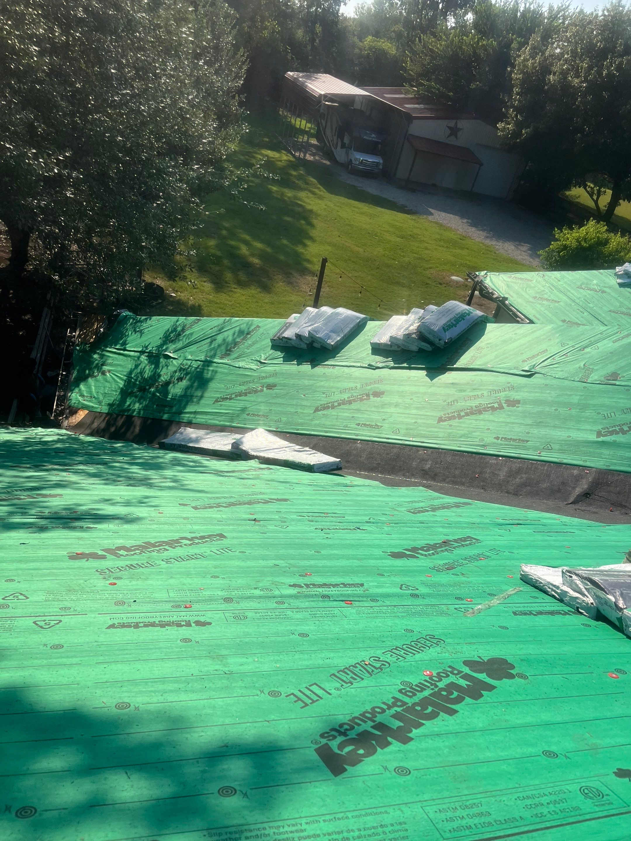 Reroof + Gutters by Berry Good Roofing 
