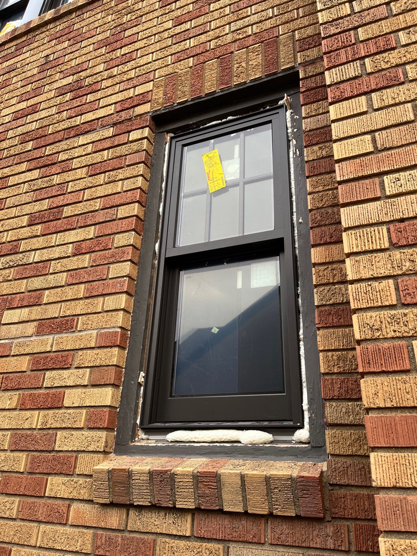 Dark Bronze Exterior Window Replacement Project in Omaha by Carps Complete Exteriors