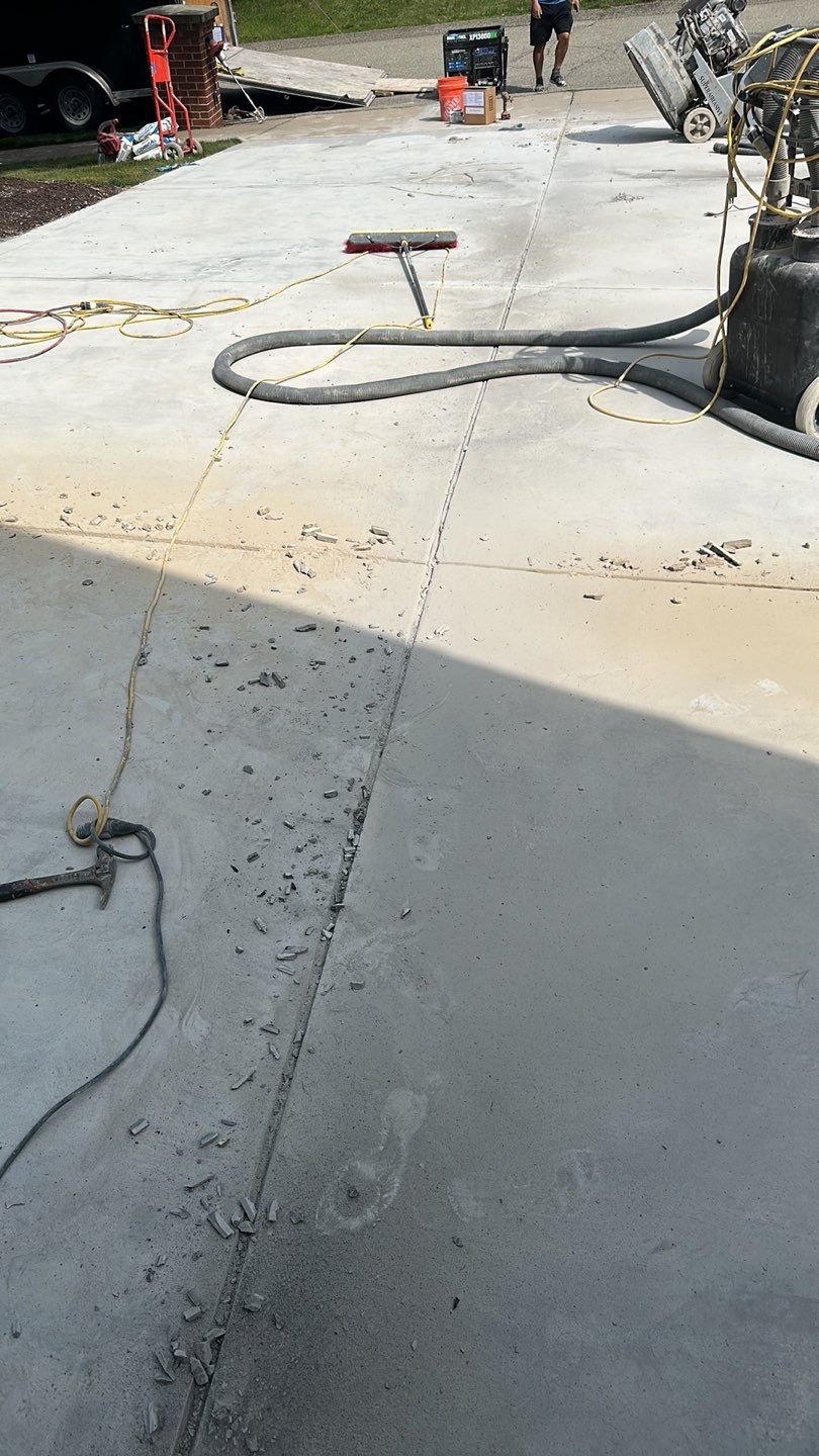 Pool Deck + Driveway + Garage Project in Venetia by Floors in a Day, Inc