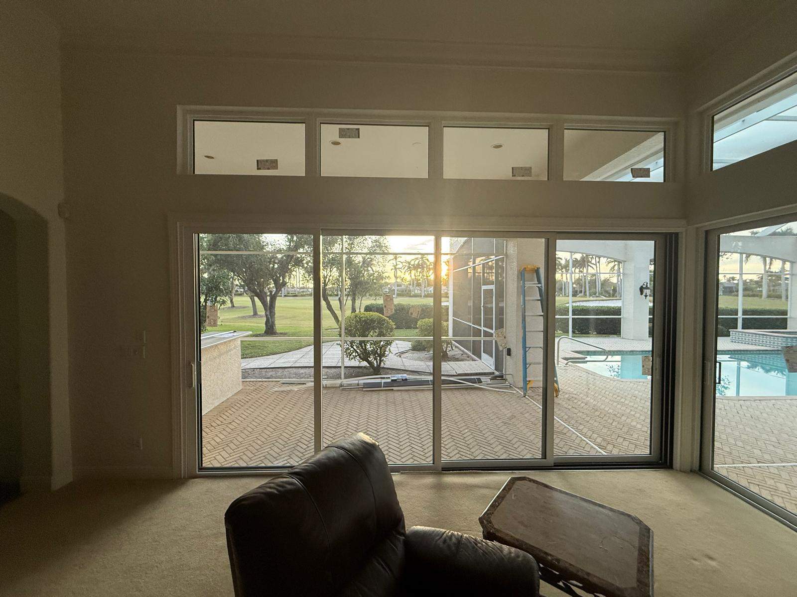 Window Installation using PGT Vinyl White-Bronze by Windows For Life 