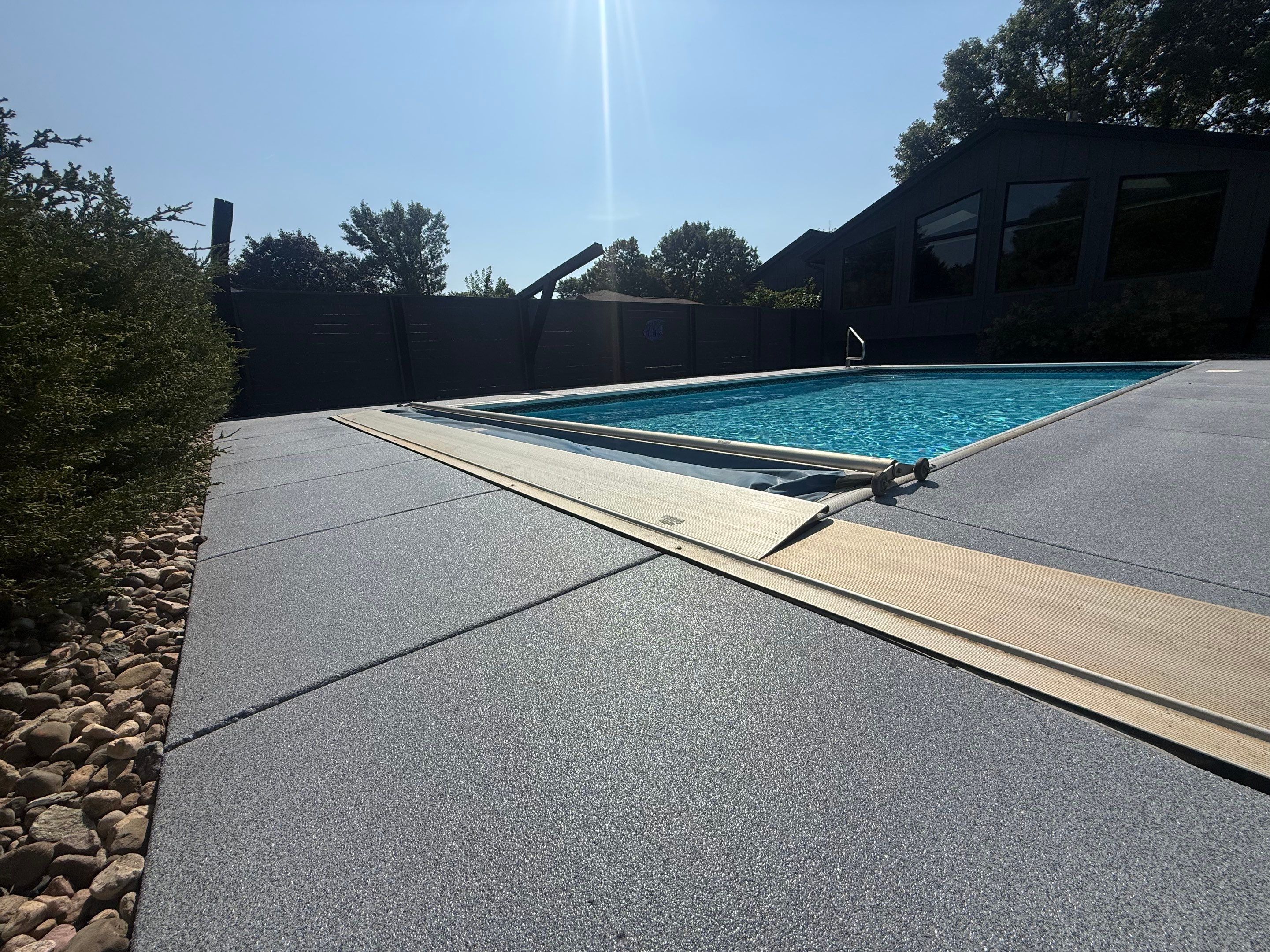 Garage Floor and Textured Pool Deck Coating in Sioux Falls by Select Painting, Coatings & Garage Cabinets