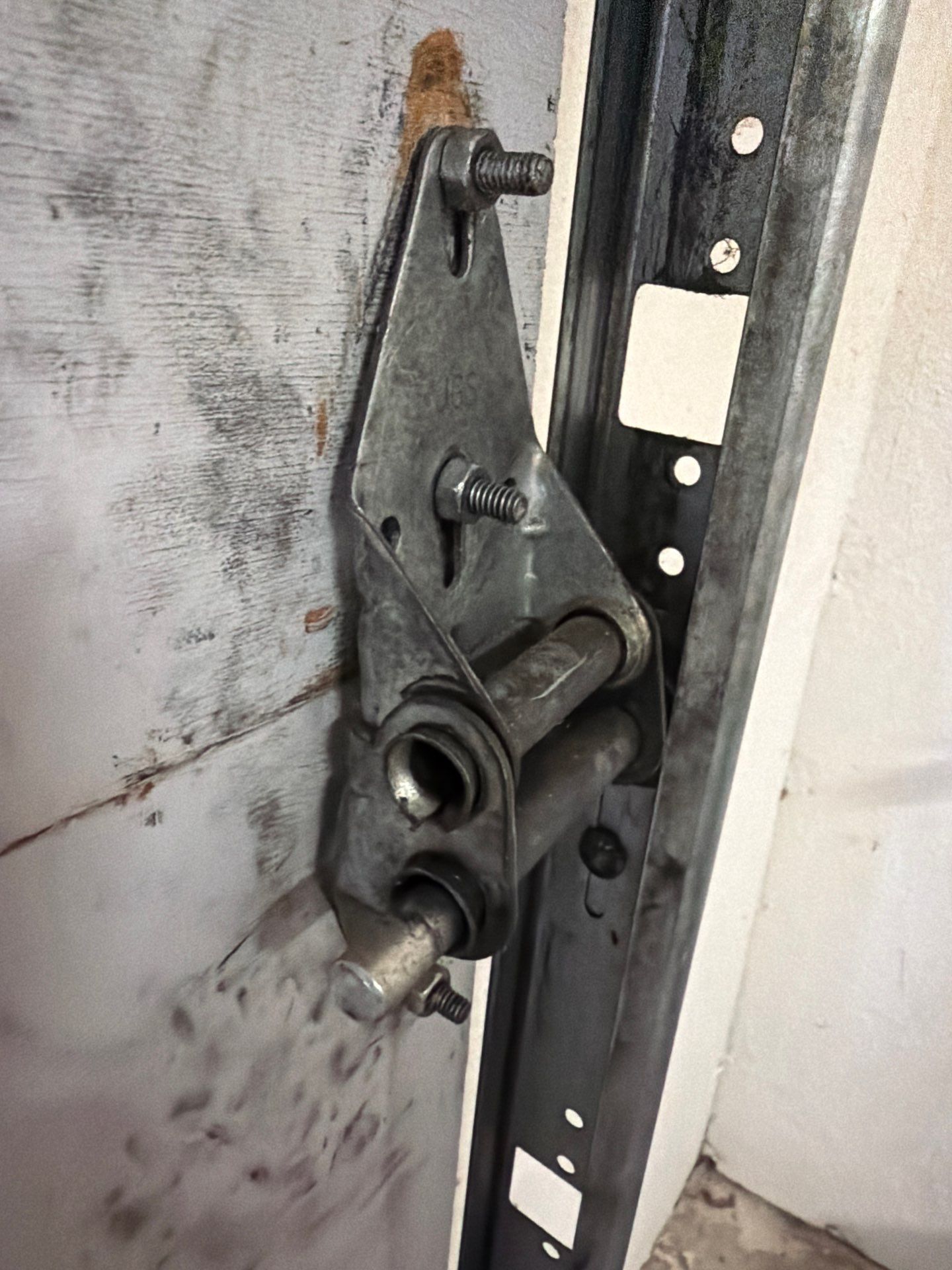 Sectional Garage Door Torsion Spring Replacement and Hardware Service by Valiant Garage Door
