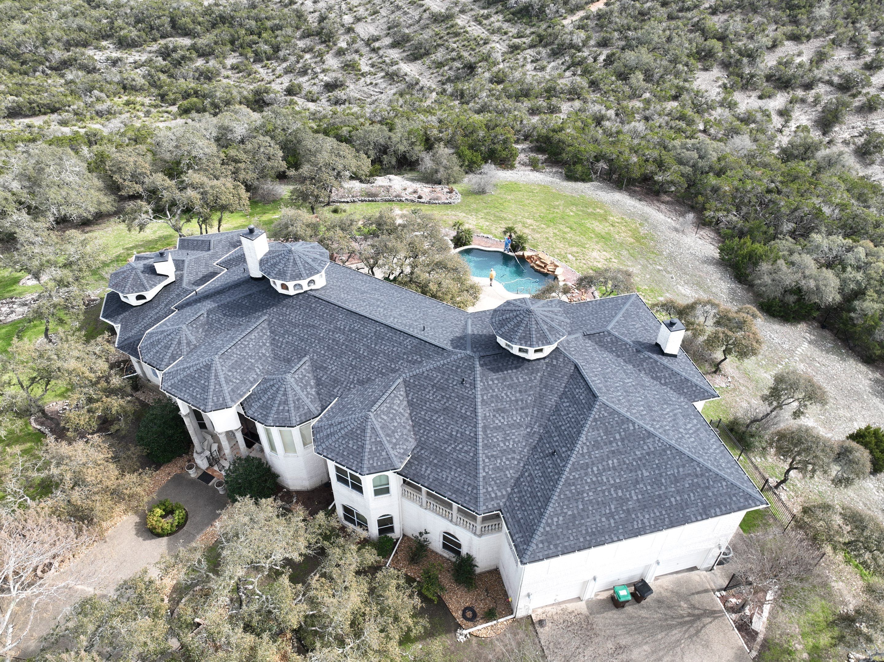 Residential Roof Replacement using 30 Year Laminate Shingles with High Profile Ridge by Premier Roofing and Contracting